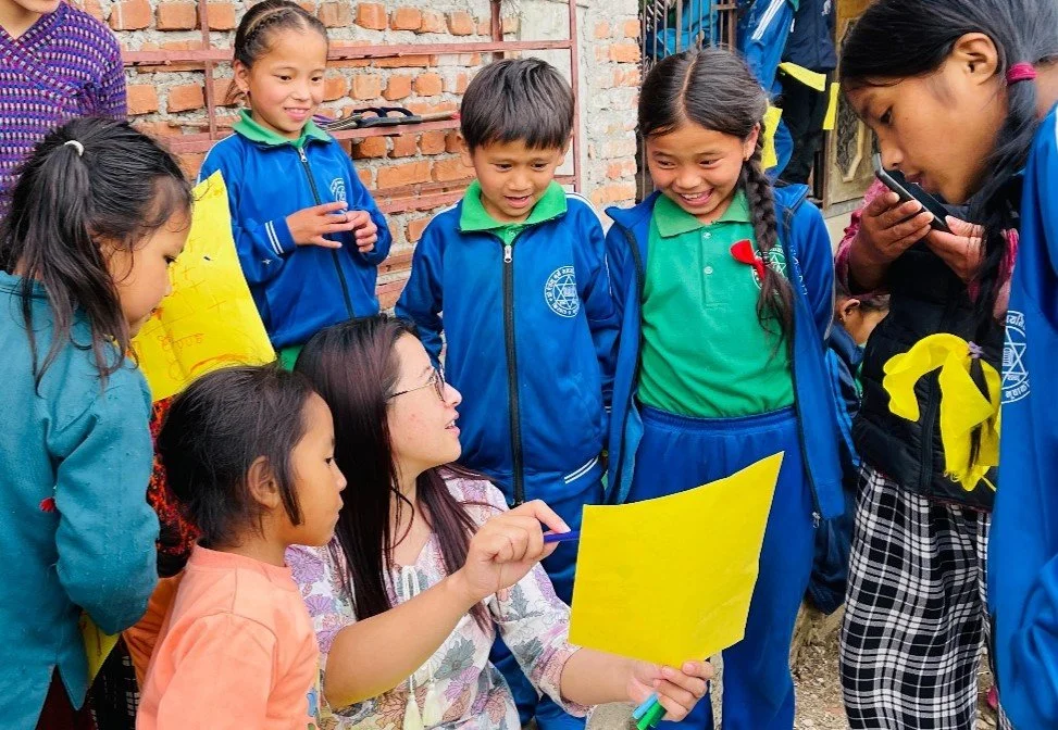 Christina with children at a Learning Space – copyright CarNetNepal