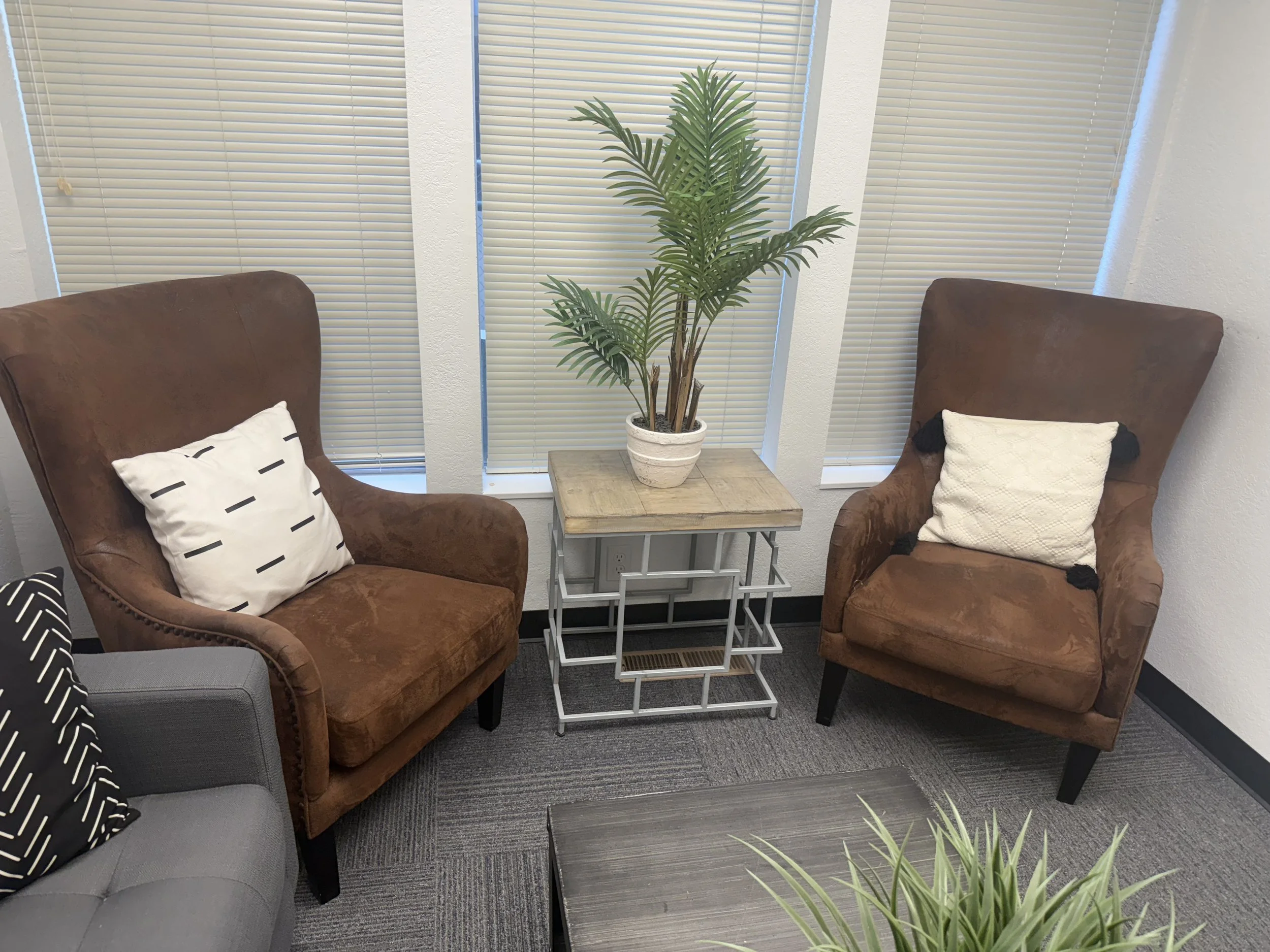 Pair of Faux Leather Wingback Chairs: $150 each