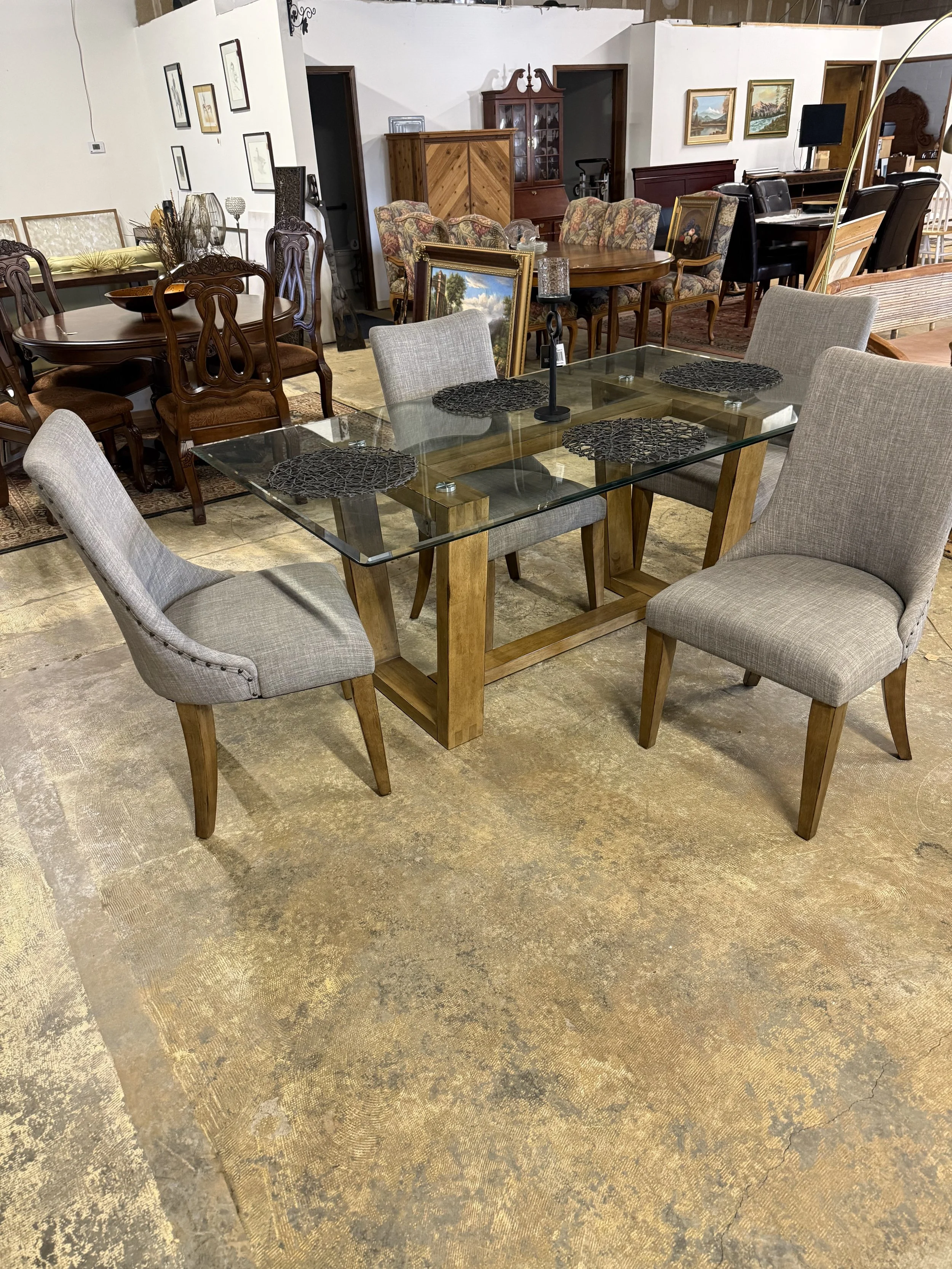 Glass-top dining table and 4 chairs: $699