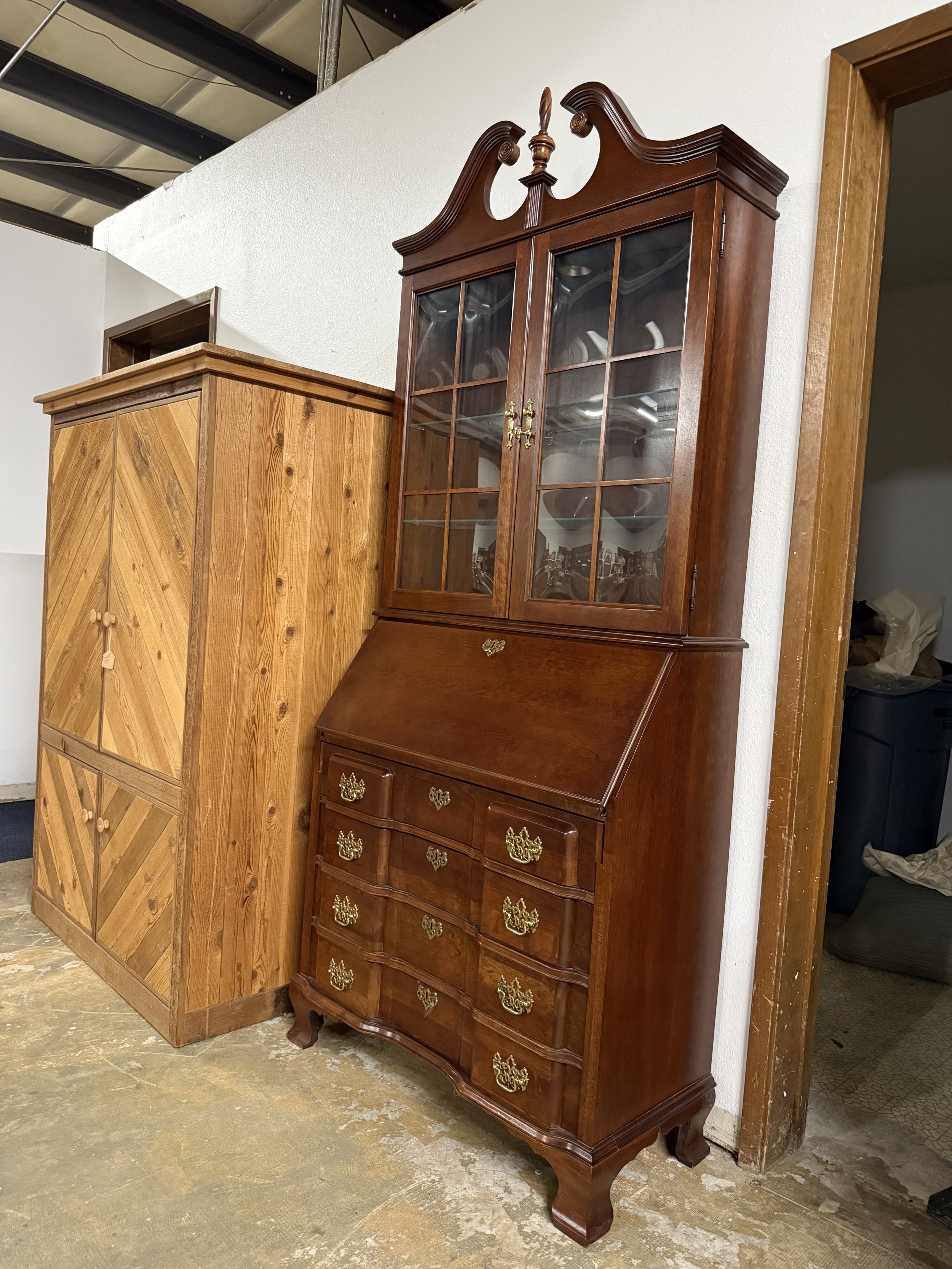Jasper Cabinet Co Chippendale-style cherry wood secretary desk and bookcase: $199