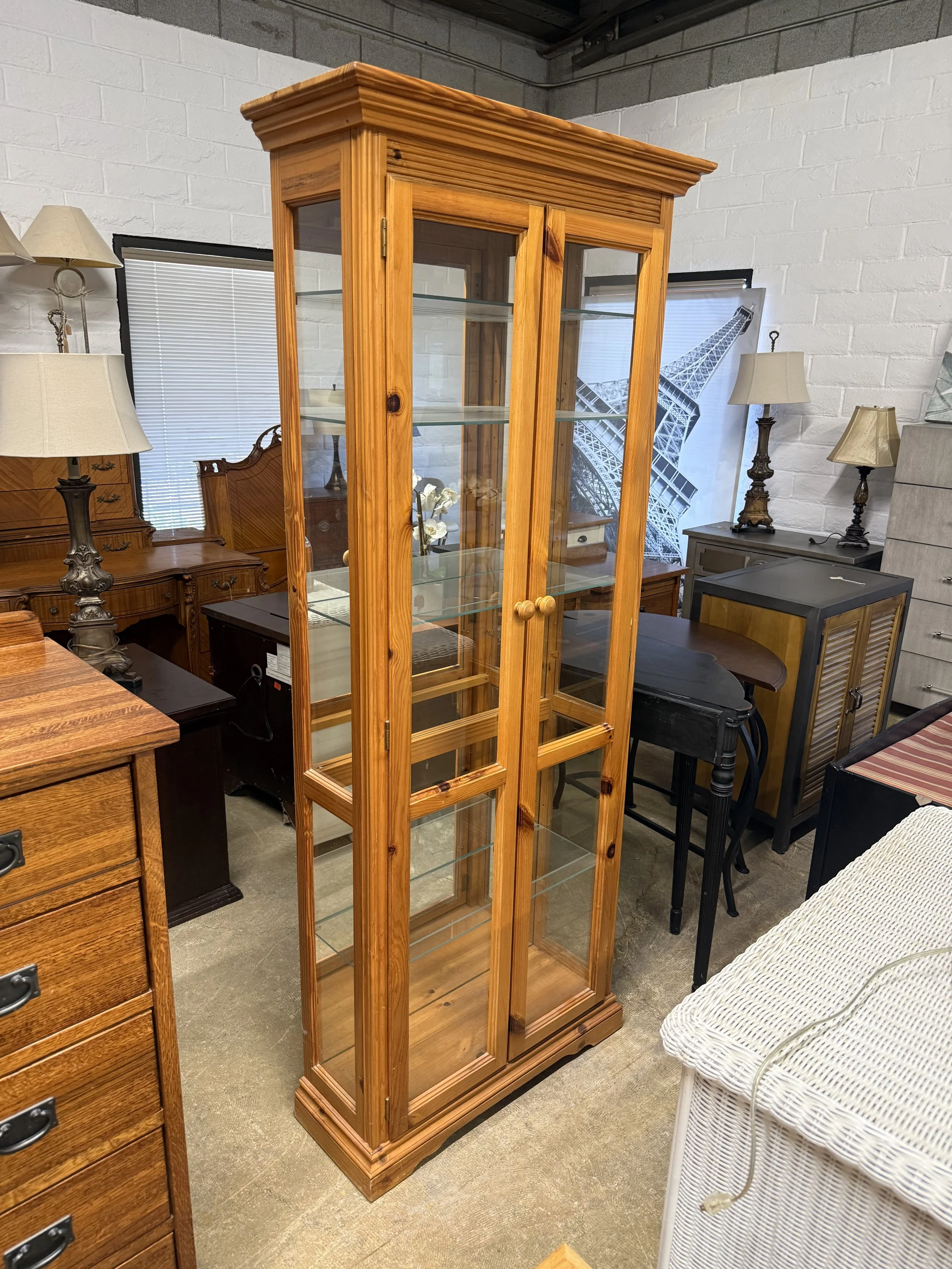 Lighted Pine Curio Cabinet with Glass Shelves: $149