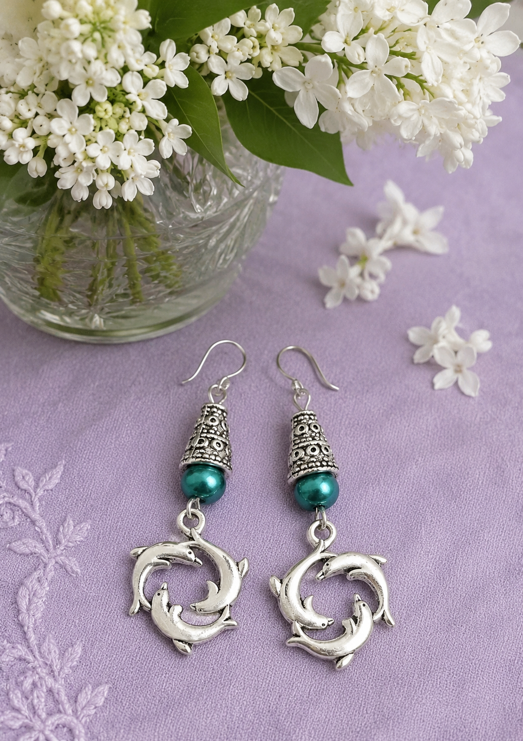 Dolphin Earrings Lace Table ChatGPT.png