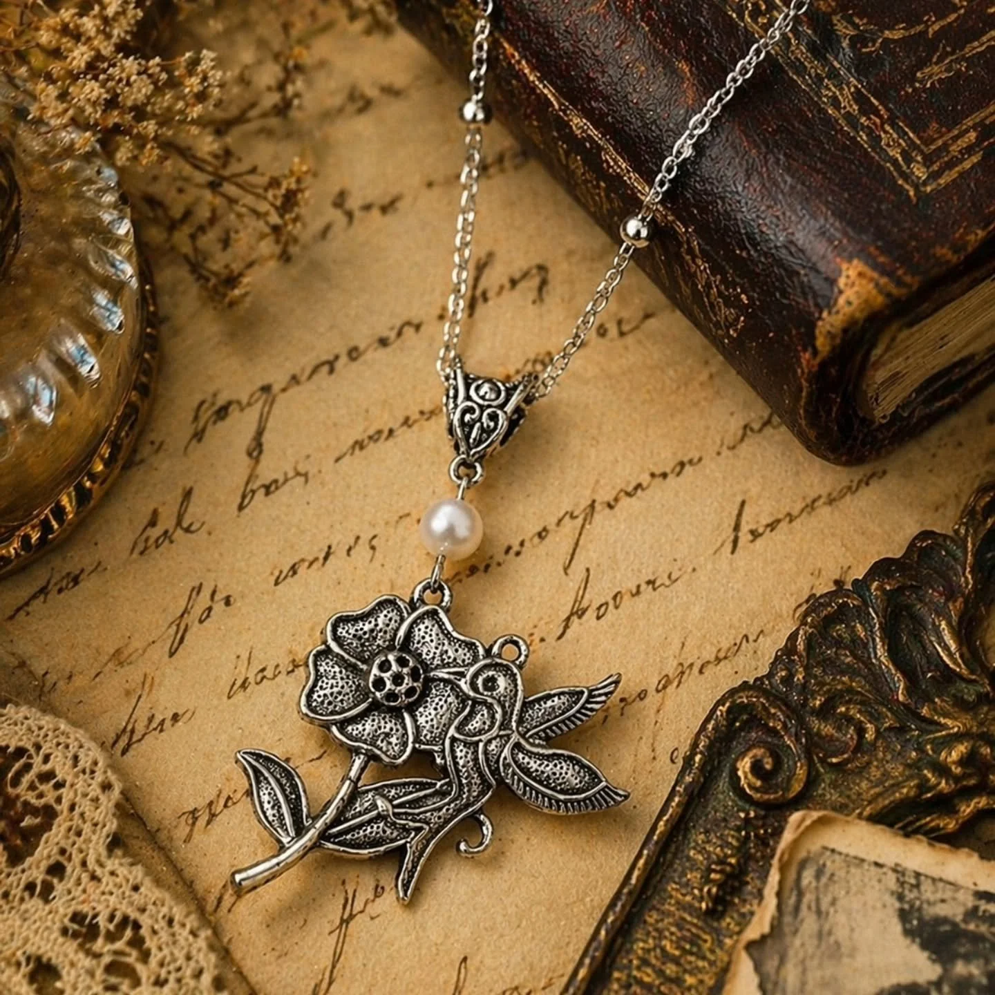 A timeless moment, captured in a piece you can carry with you. 

12:13 Jewelry💎
Hand crafted pearl hummingbird necklace on a sterling silver chain.

#1213jewelry #hummingbird #vintagestyle