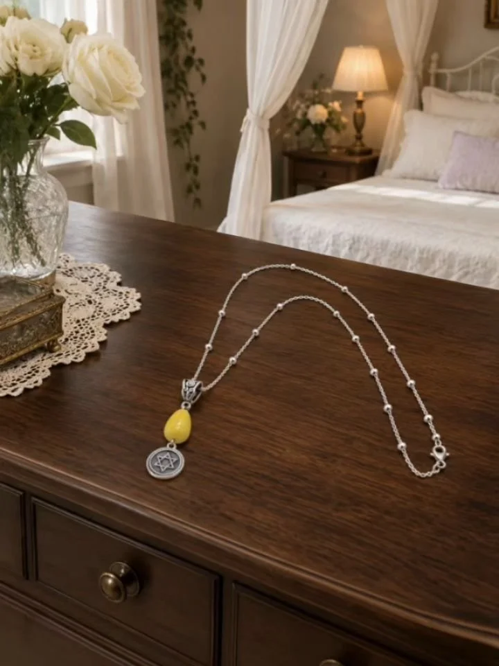 Even in difficult seasons, you are still held, guided, and deeply loved.

This necklace is a gentle reminder that faith is not about never struggling, it is about knowing that you are never walking alone. The light of God still surrounds you, even on