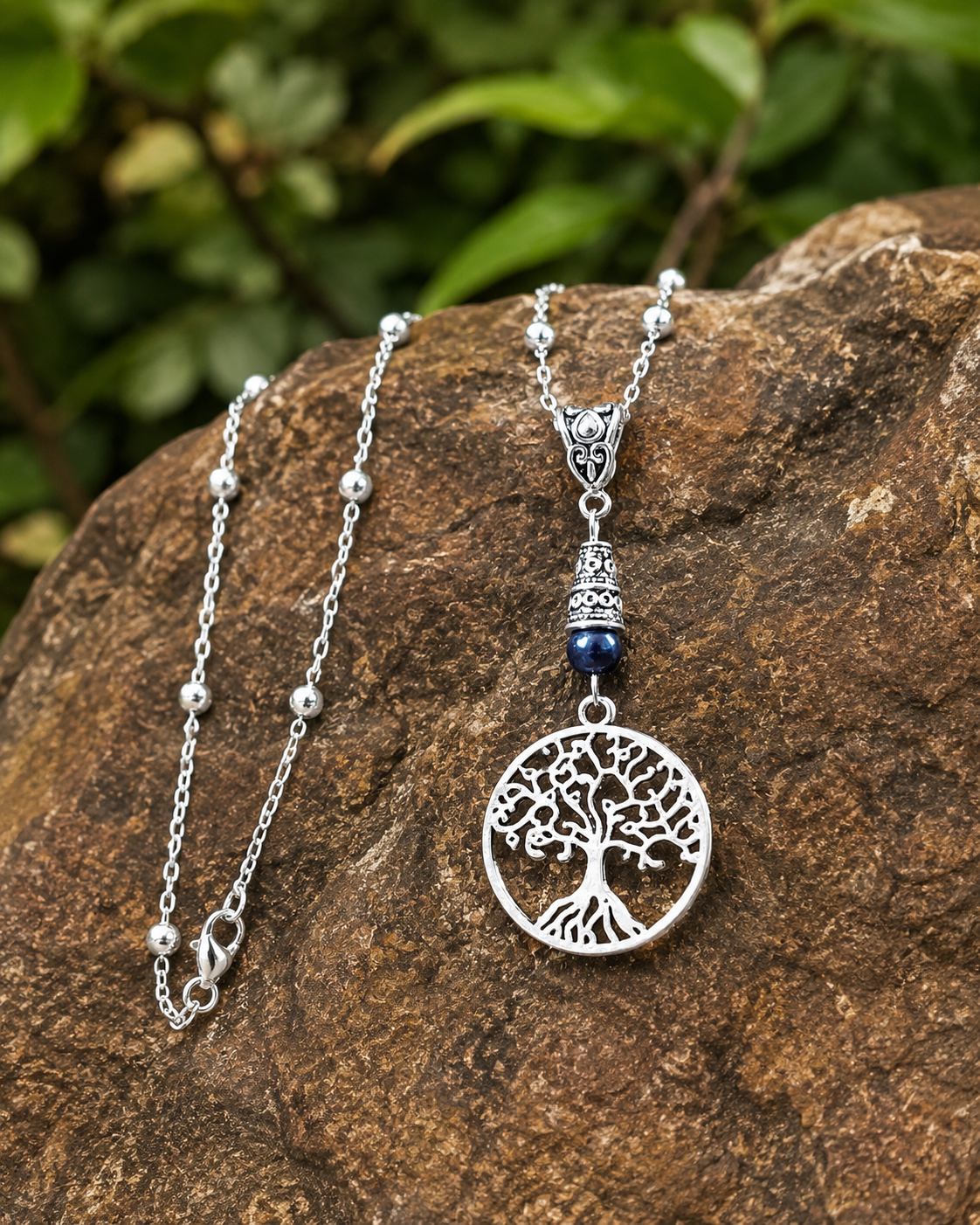 Tree Of Life Handmade Necklace on a Sterling Silver Chain with a Blue Accent