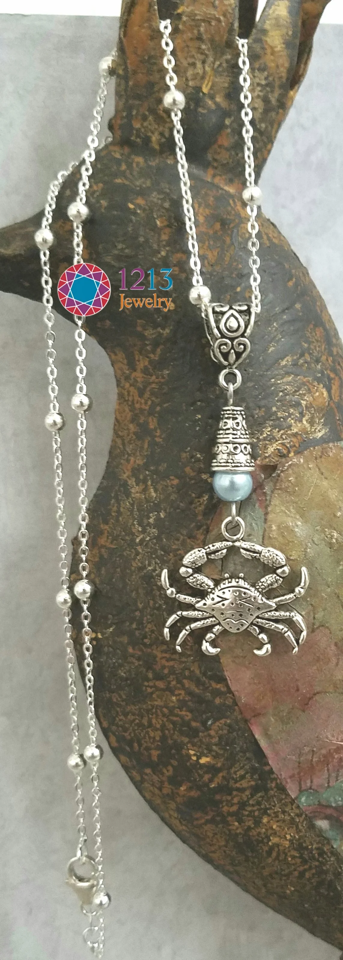 Crab Necklace Full Bird Logo.jpg