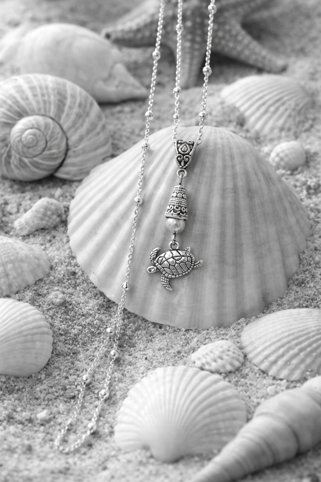 Turtle Necklace Black and White Sea Shells ChatGPT.png