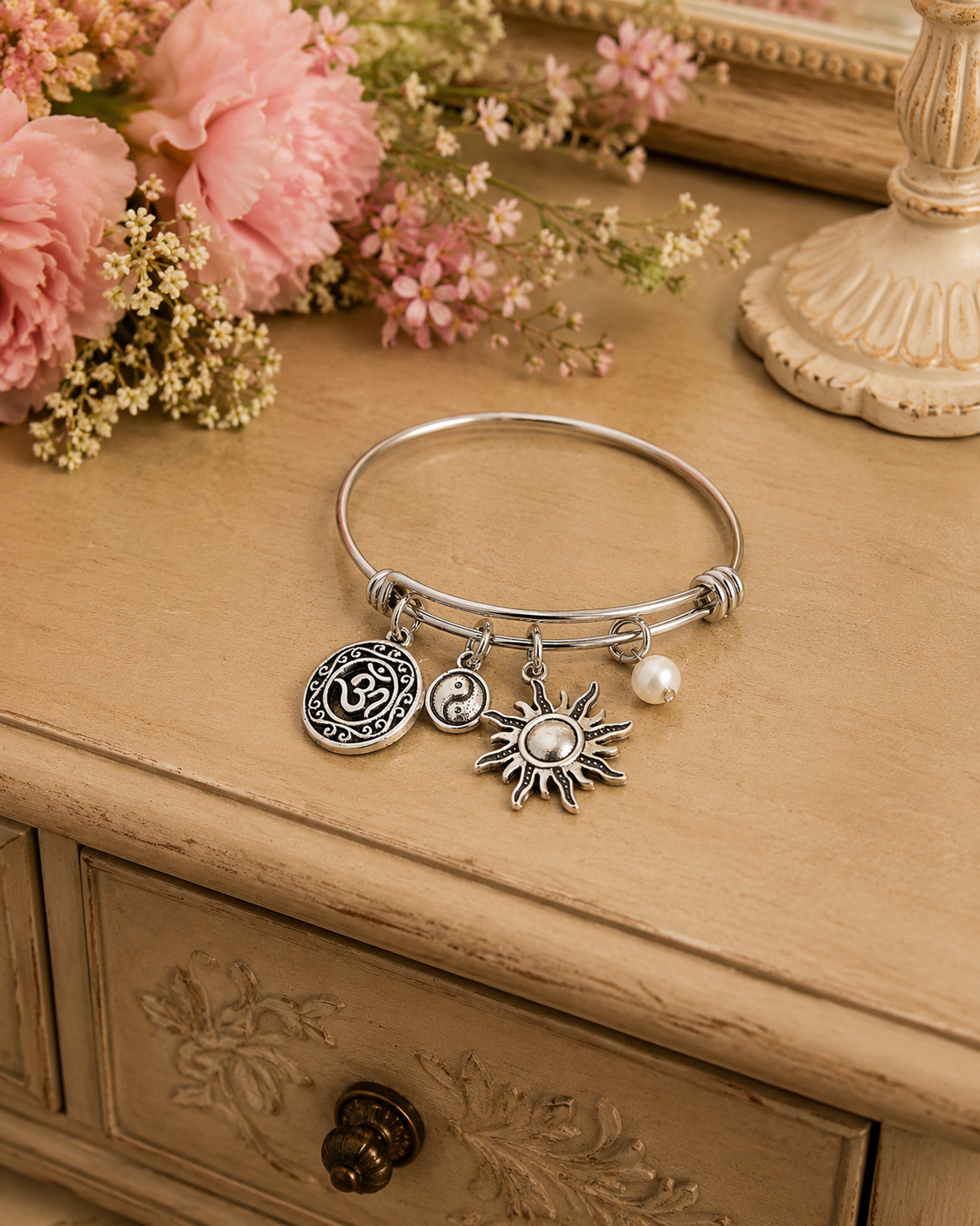 Om Yin Yang Sun Pearl Bracelet Tan Dresser ChatGPT.png