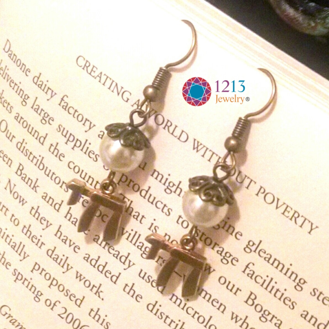 Chai Earrings Logo White Accent Book.png
