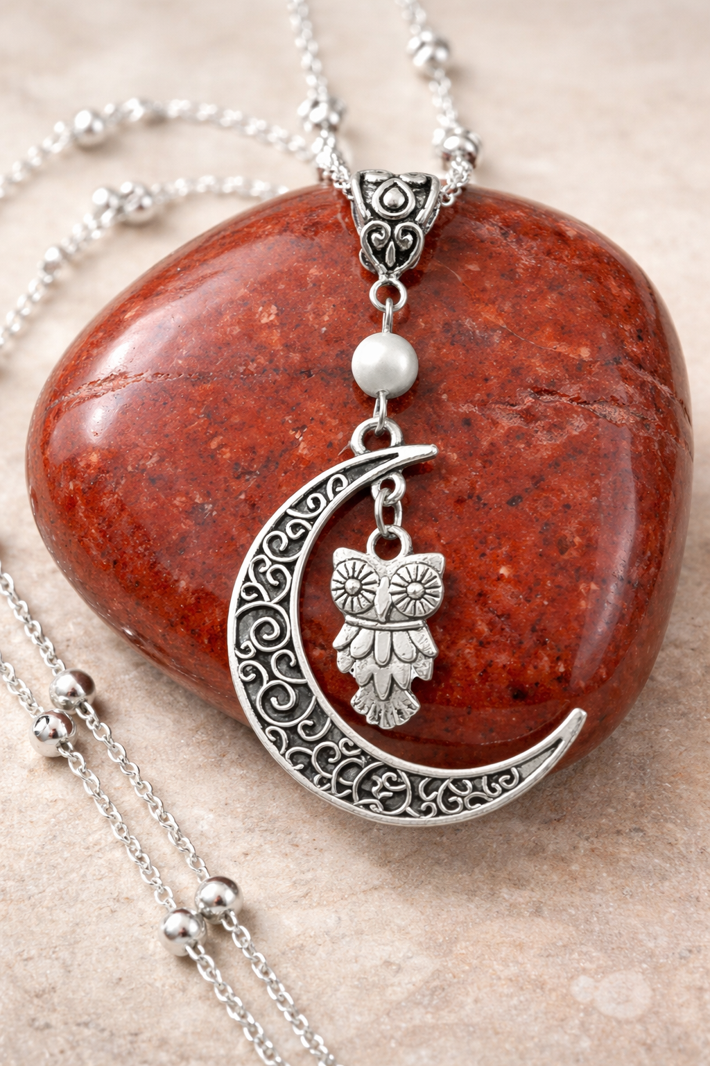 Owl Moon Pearl Necklace Red Stone ChatGPT.png