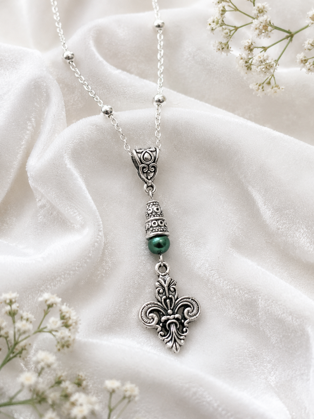 Fleur De Lis Necklace Green Accent Velvet ChatGPT.png