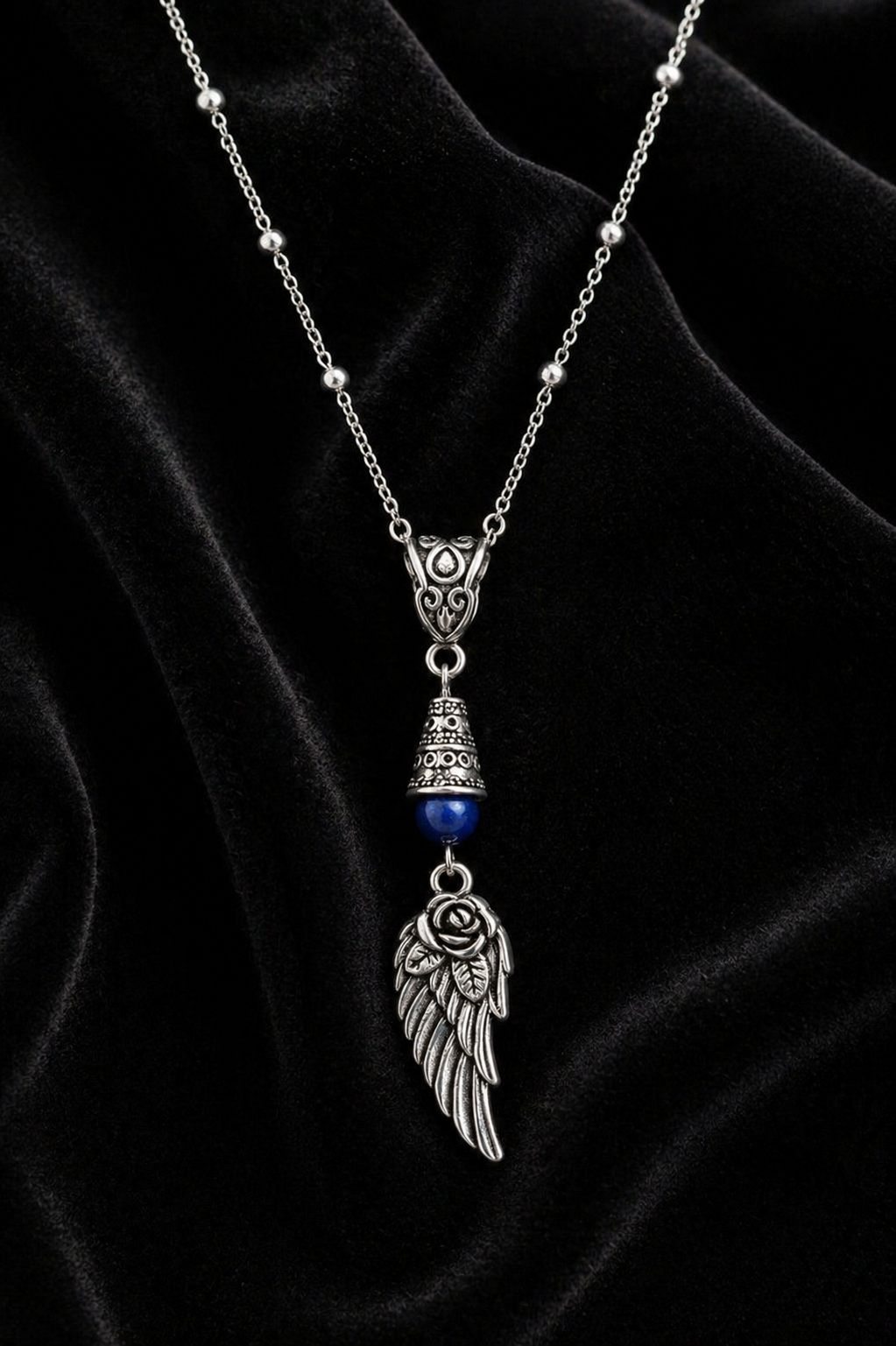 Wing Necklace Blue Accent Velvet ChatGPT.png