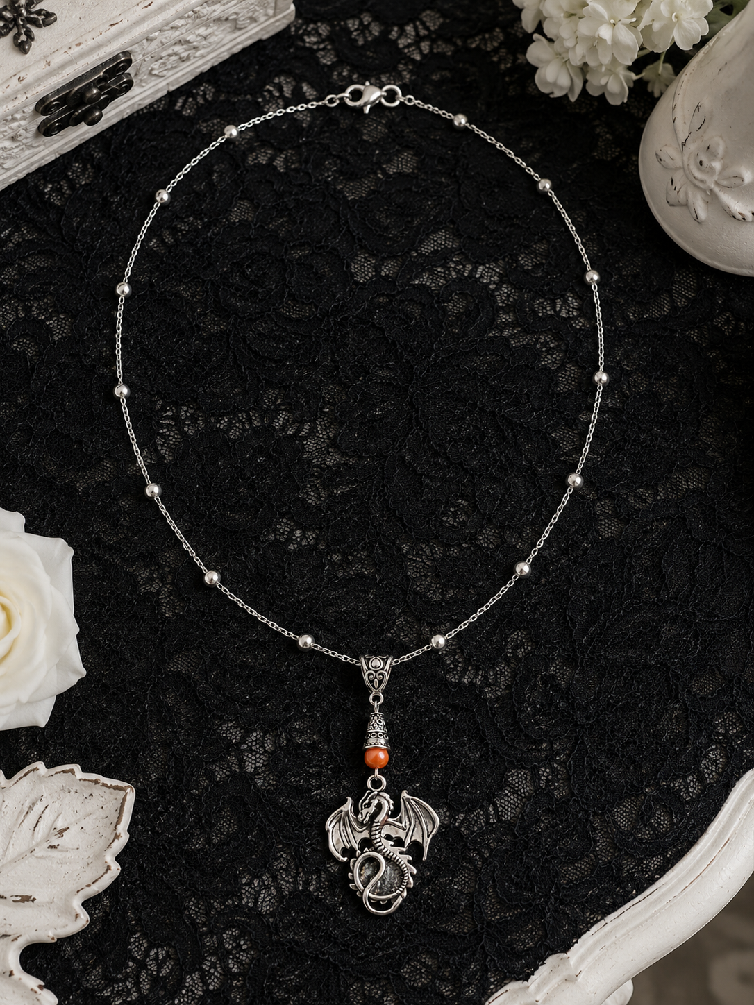 Dragon Necklace Orange Dresser ChatGPT.png
