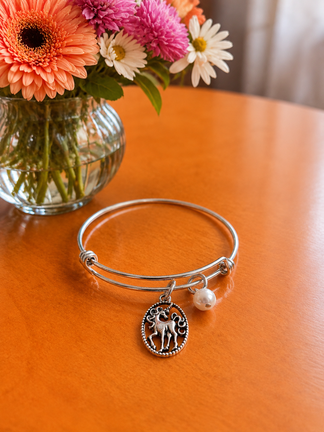 Unicorn Pearl Bracelet REMAKE Orange Table ChatGPT.png