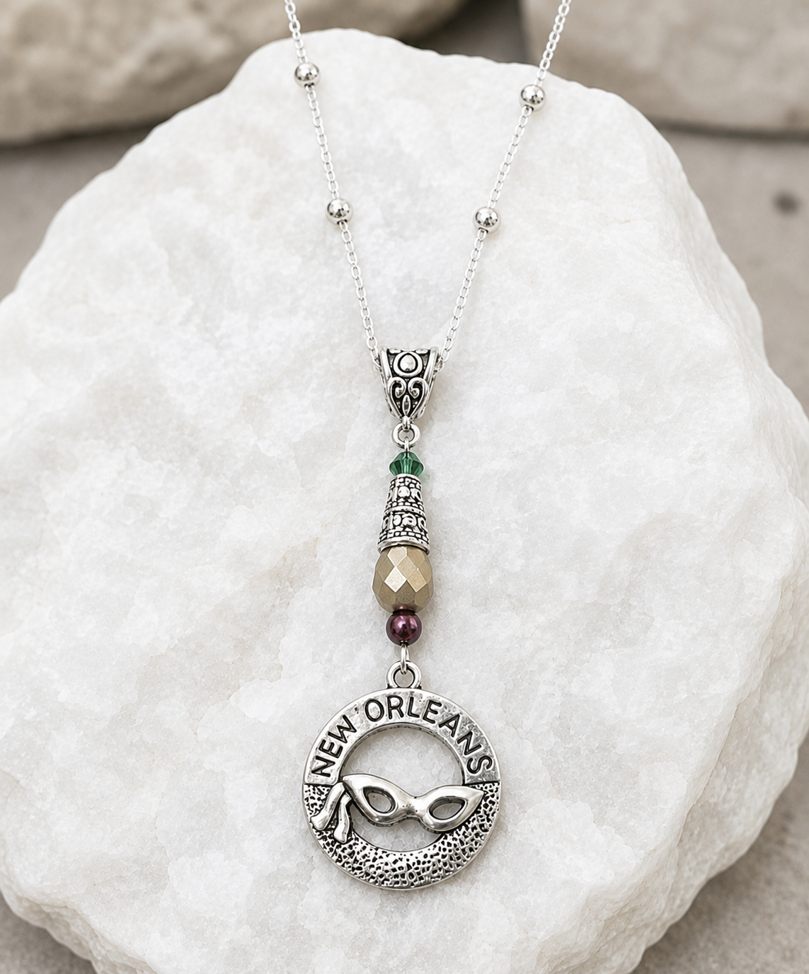 New Orleans Mardi Gras Necklace Rock ChatGPT.png