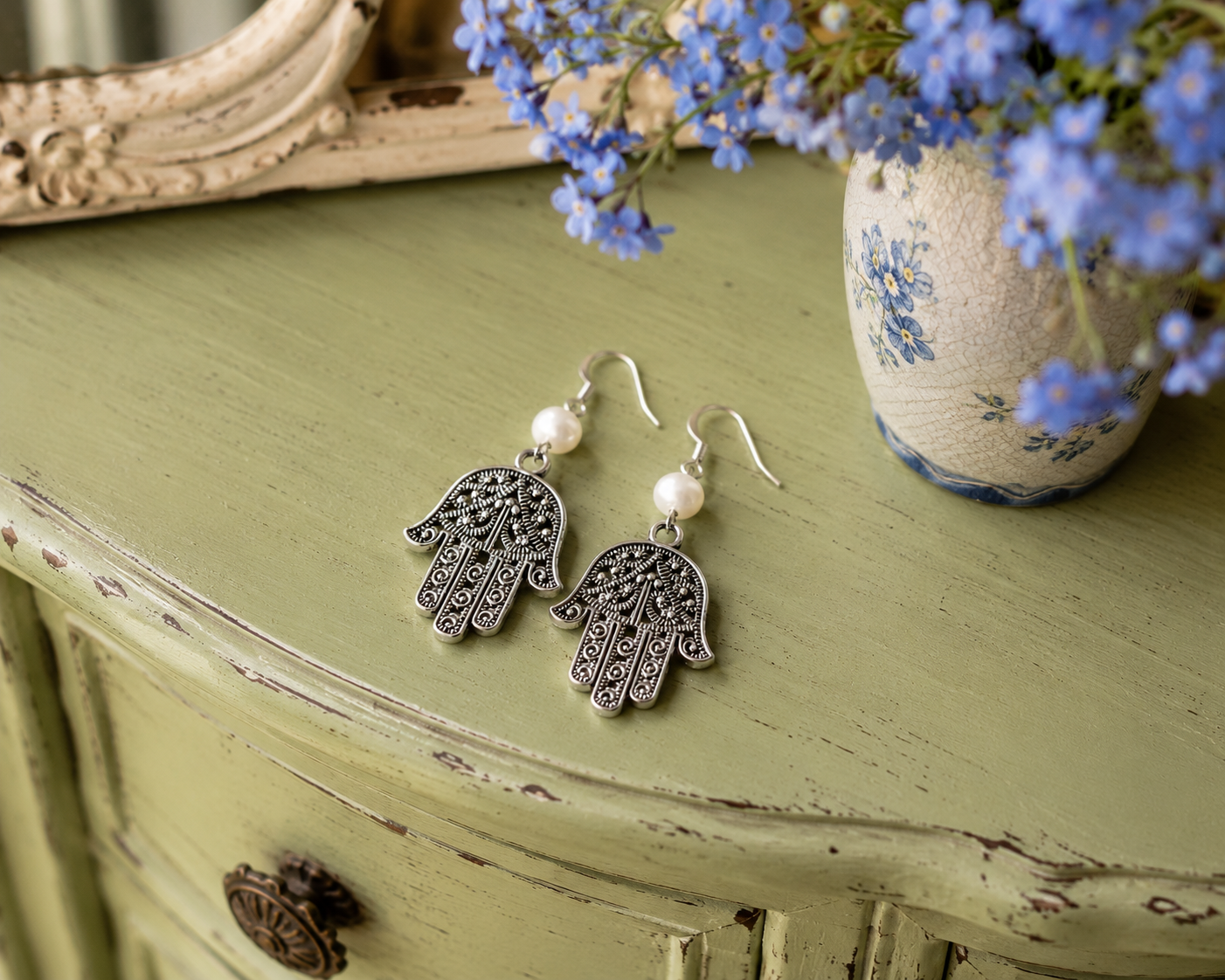Hamsa Pearl Earrings Dresser ChatGPT.png