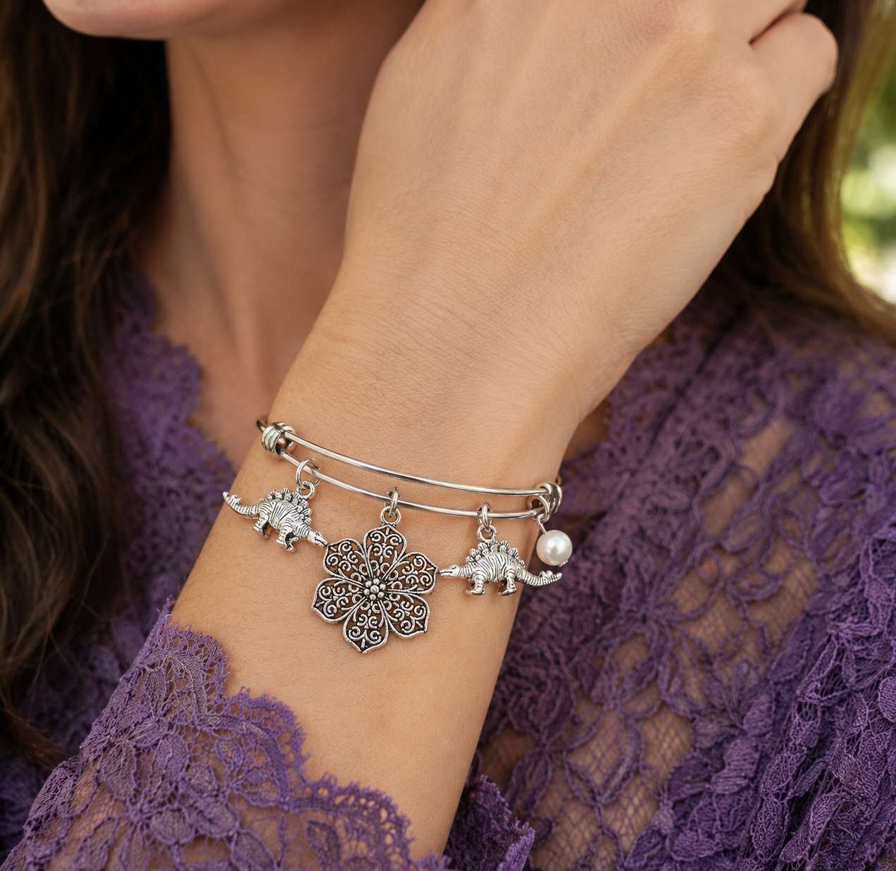 Dinosaur Pearl Bracelet Woman ChatGPT.png