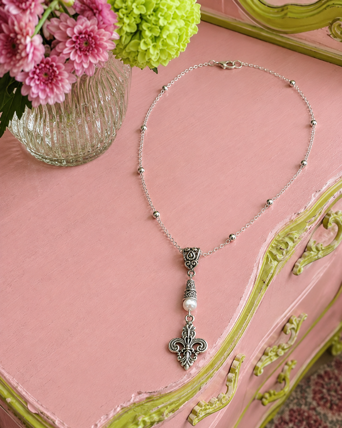 Fleur De Lis Necklace White Dresser ChatGPT.png