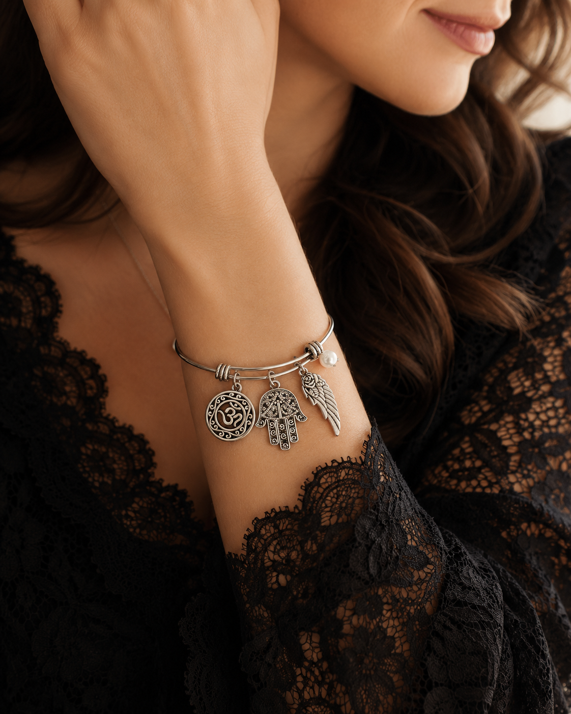 Om Hamsa Wing Pearl Bracelet Model ChatGPT.png