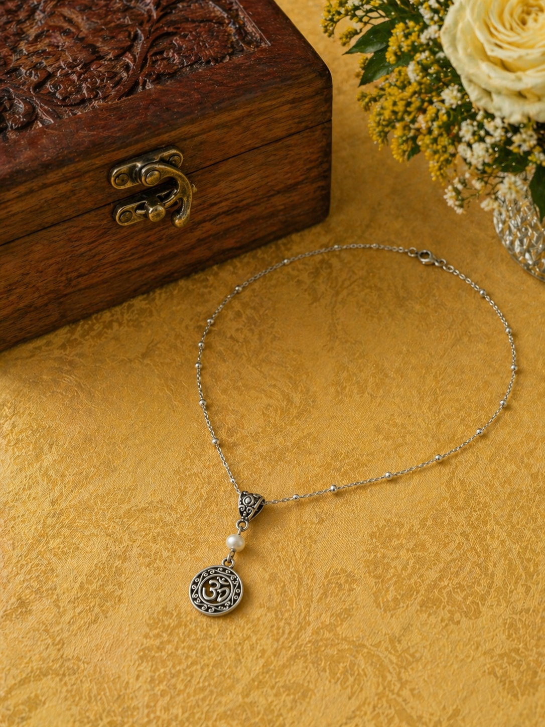 Om Pearl Necklace Yellow Jewelry Box ChatGPT.png