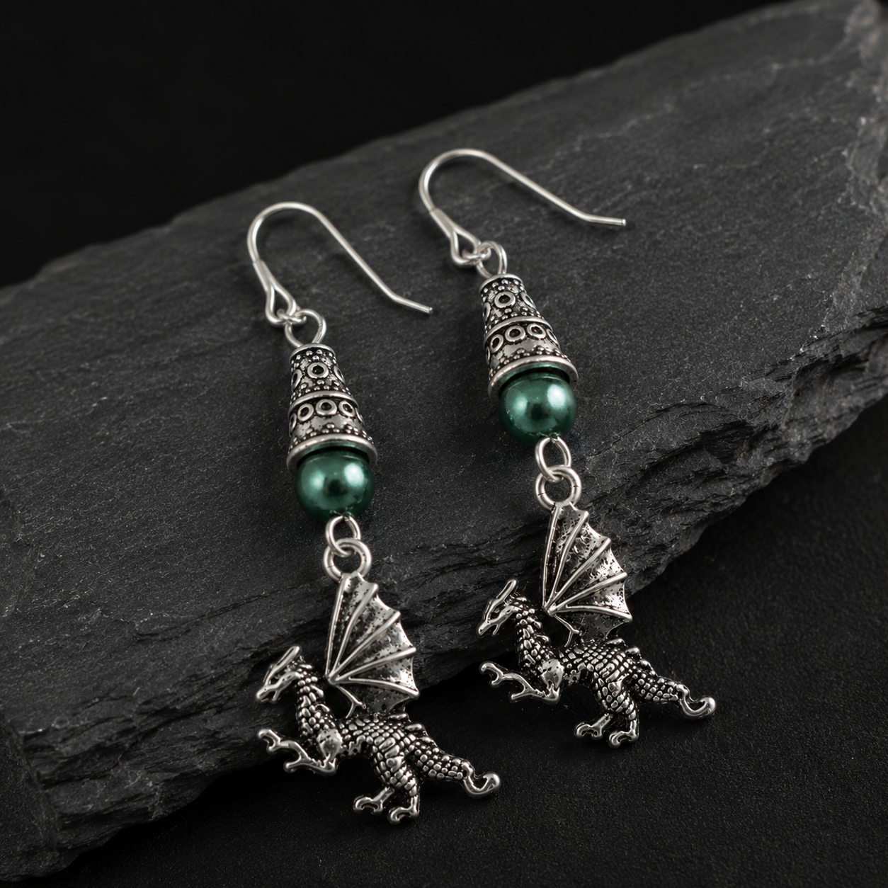 Dragon Earrings Black Rock ChatGPT.png