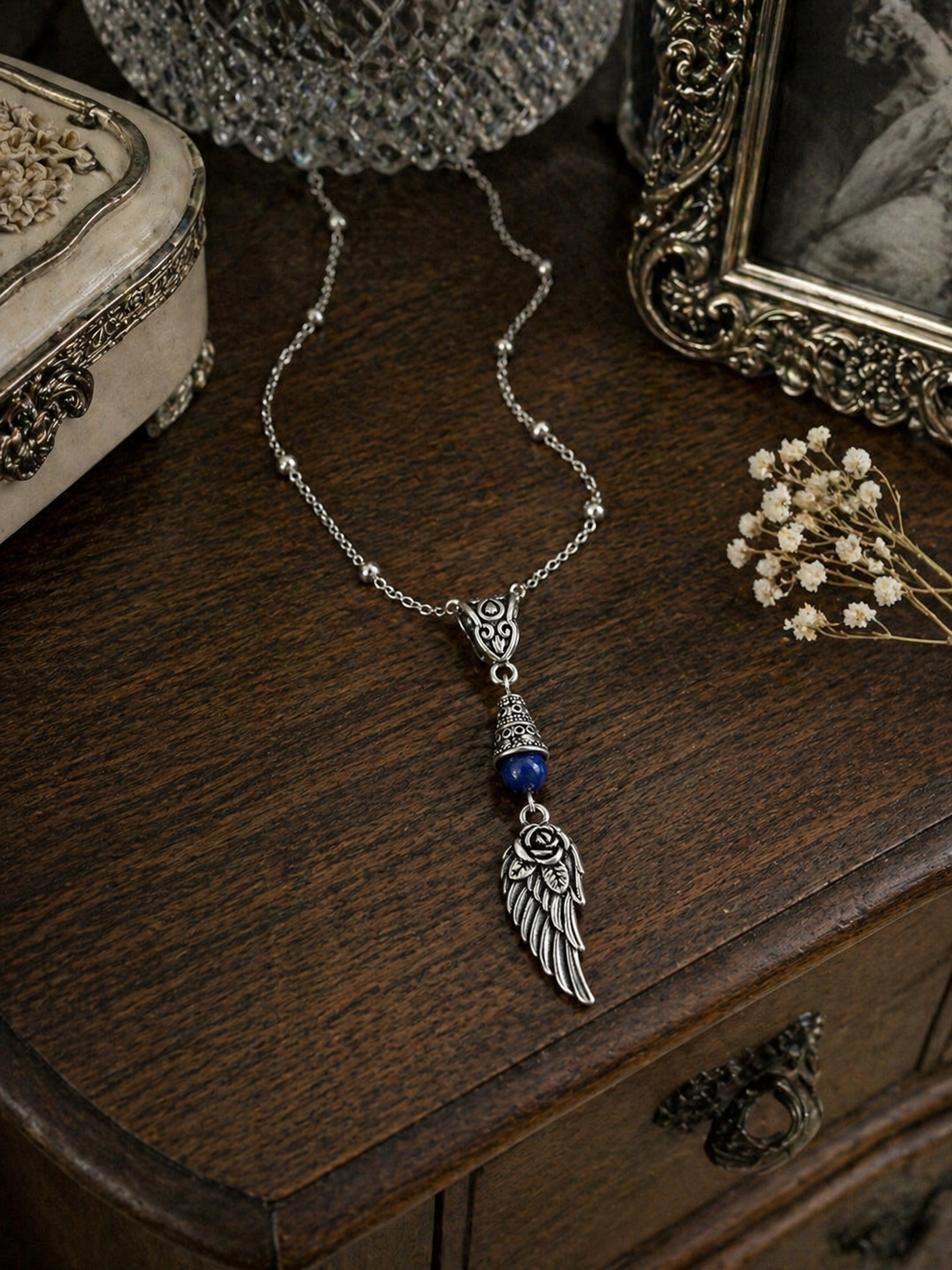 Wing Handmade Necklace on a Sterling Silver Chain with a Blue Accent
