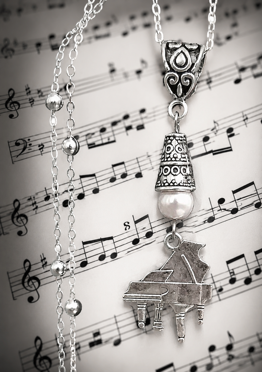Piano Necklace Musical ChatGPT.png