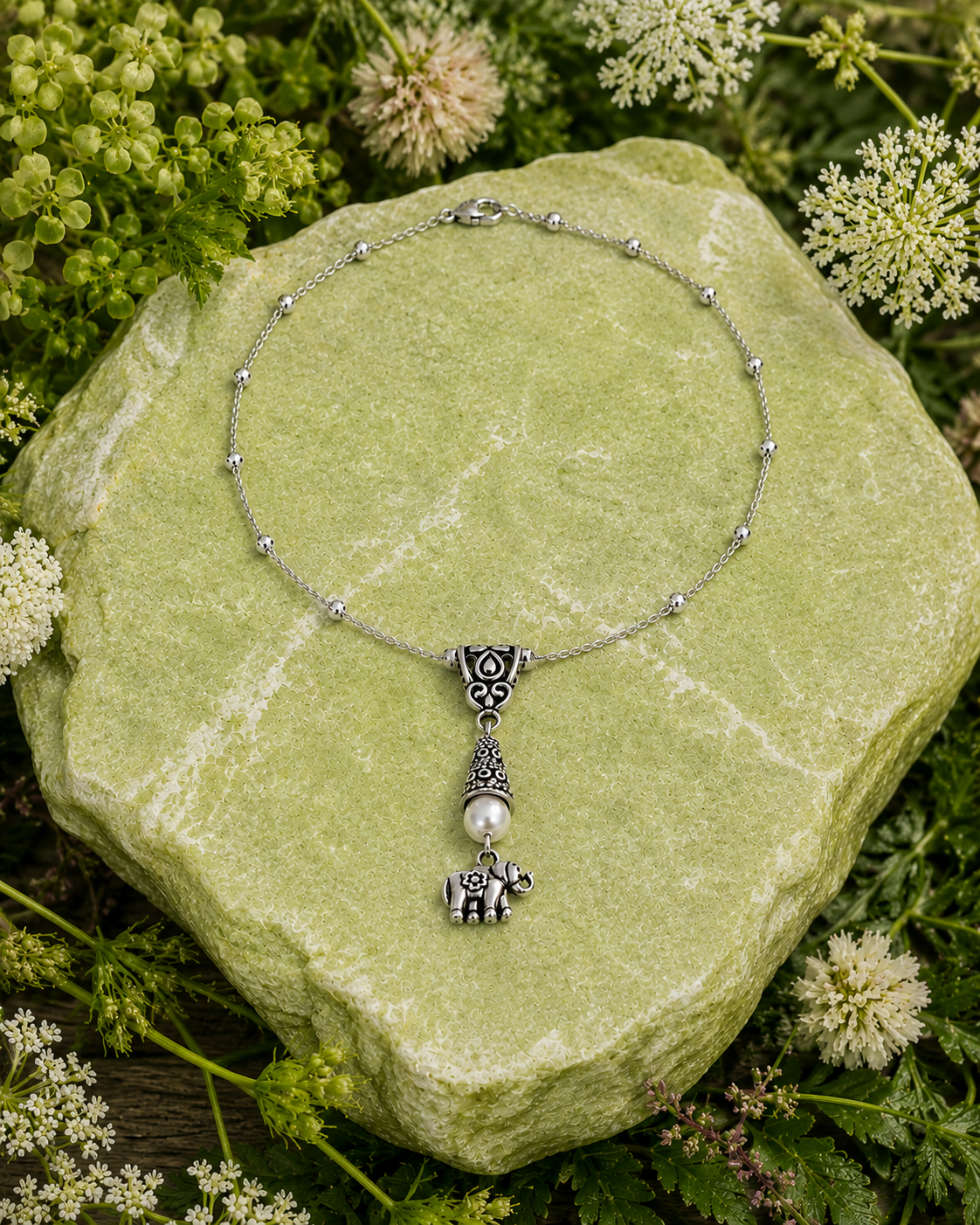 Elephant Necklace Rock Flowers ChatGPT.png