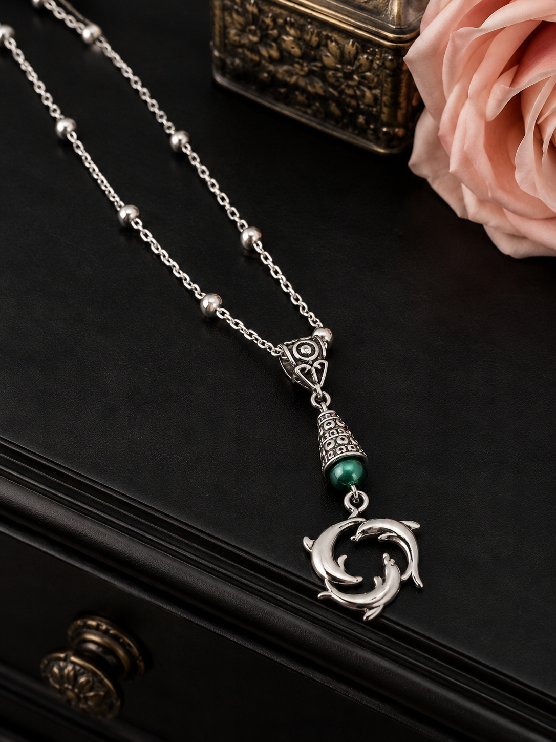 Dolphin Necklace Green Dresser ChatGPT.png