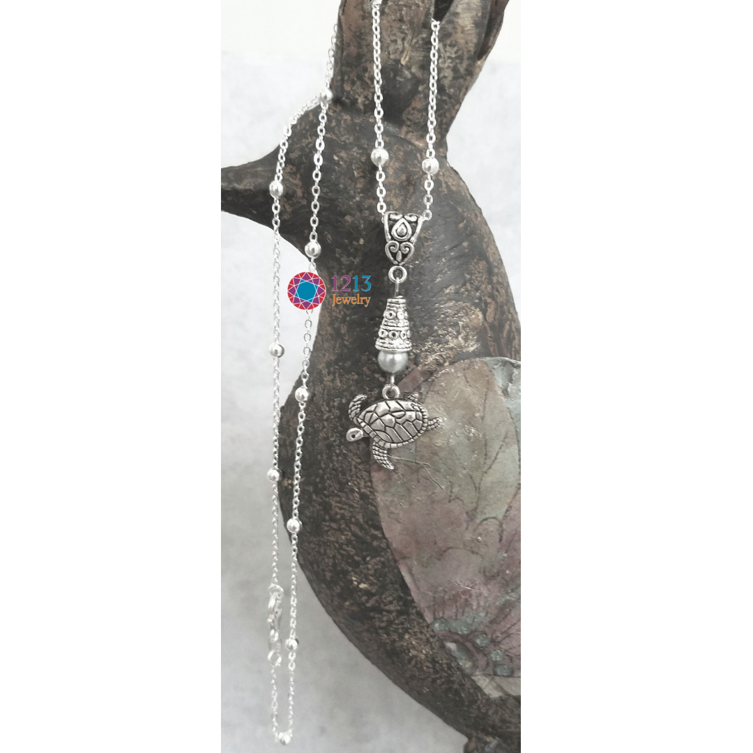 Turtle Necklace Logo Full Bird.png