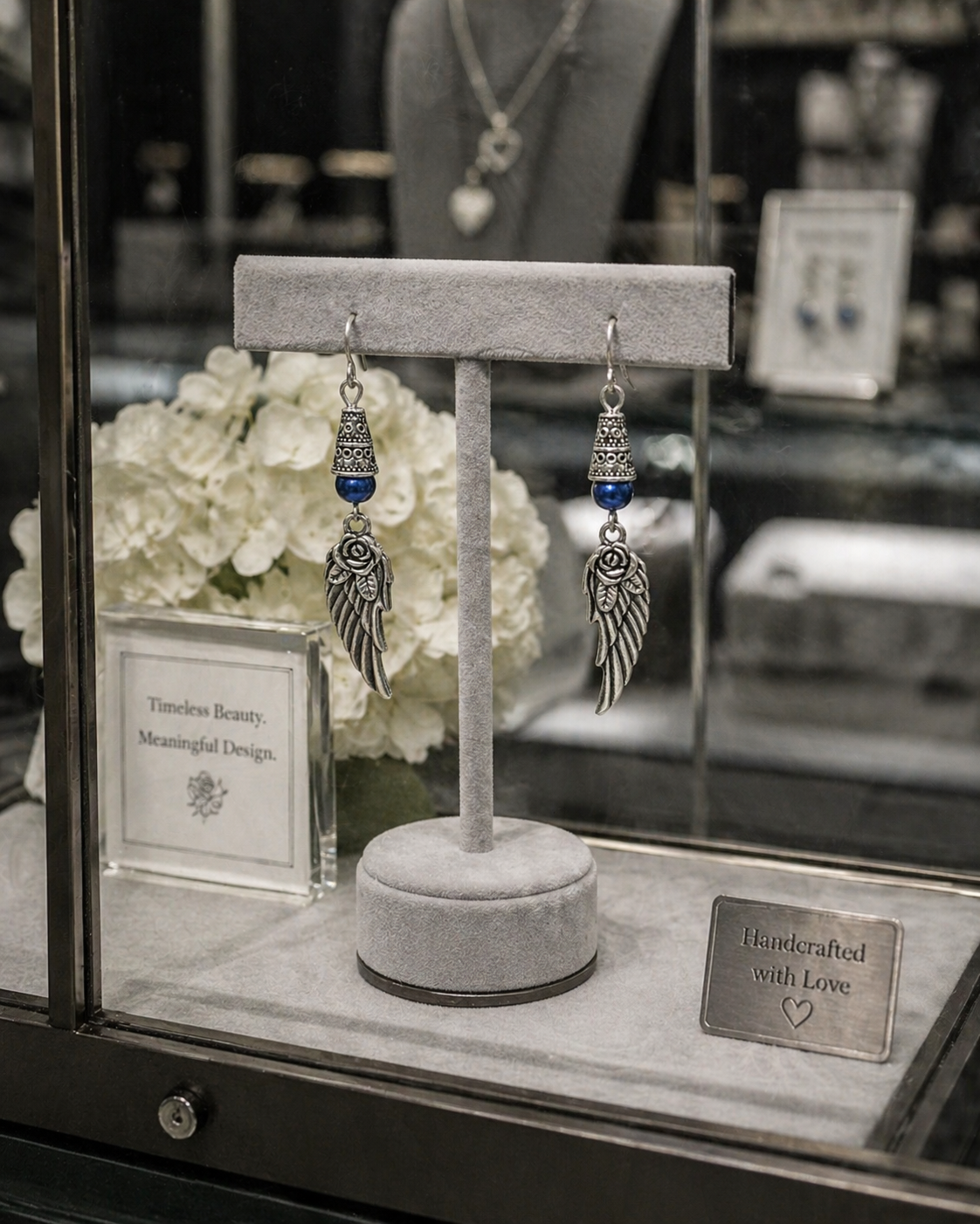 Wing Blue Earrings Shop Window ChatGPT.png