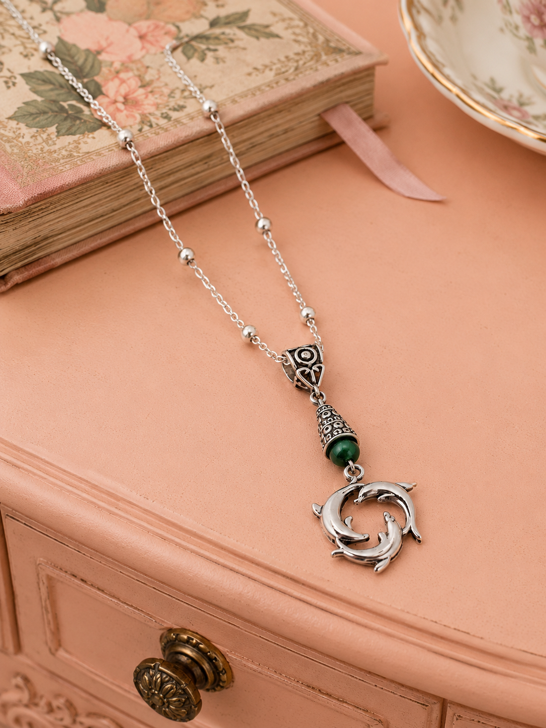 Dolphin Necklace Green Dresser ChatGPT (2).png