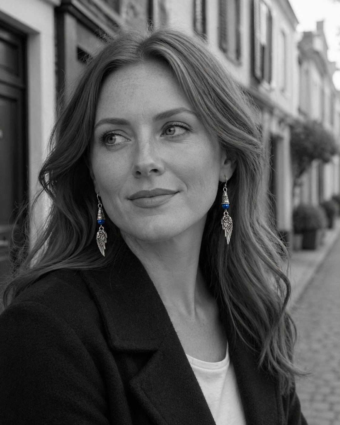 Wing Blue Earrings Model ChatGPT.png