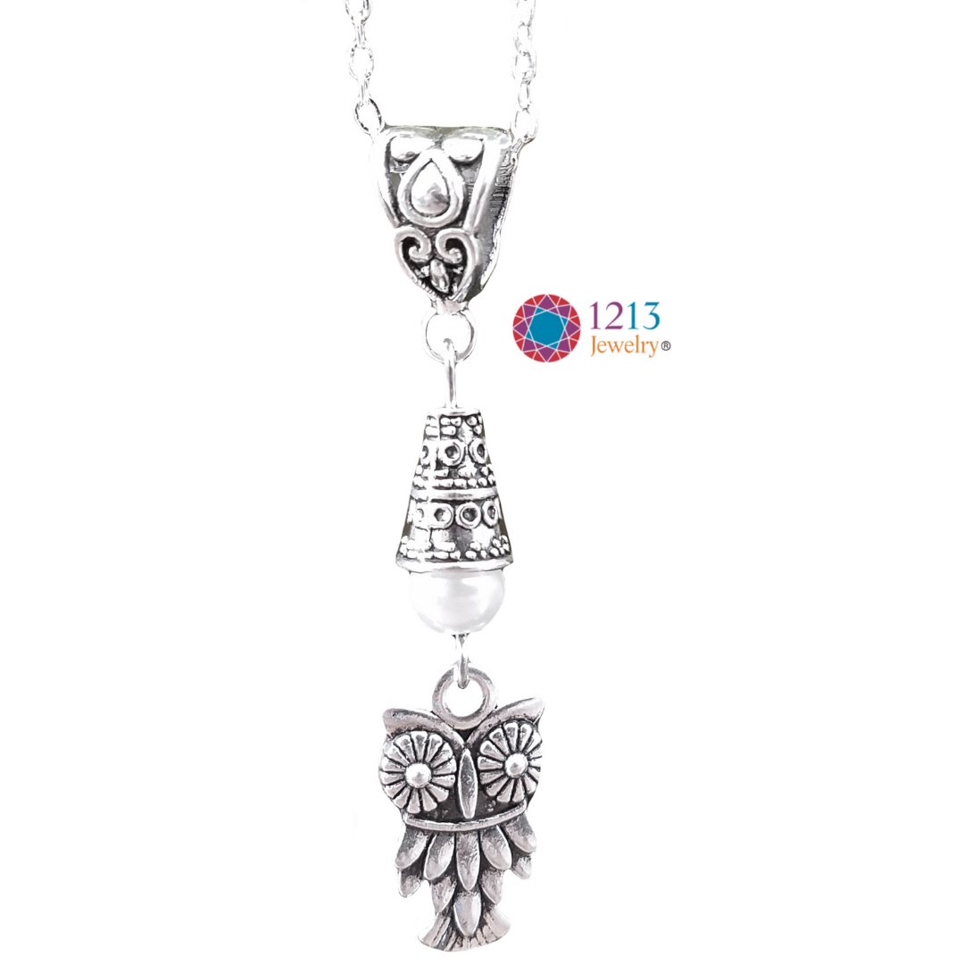 Owl Logo Necklace Close White Background.png
