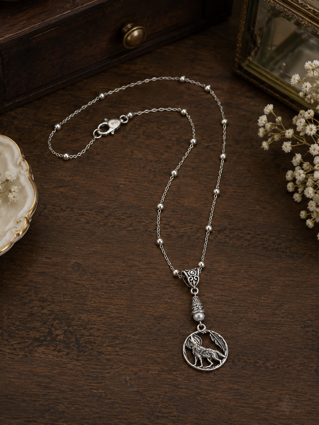 Wolf Necklace Gray Accent Dresser ChatGPT.png
