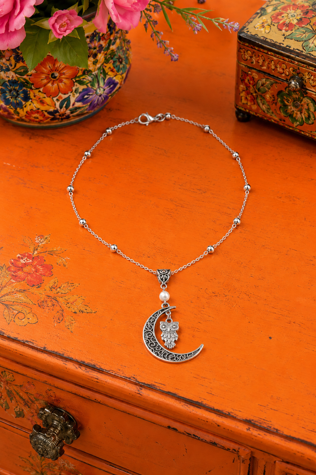 Owl Moon Pearl Necklace Orange Dresser ChatGPT.png