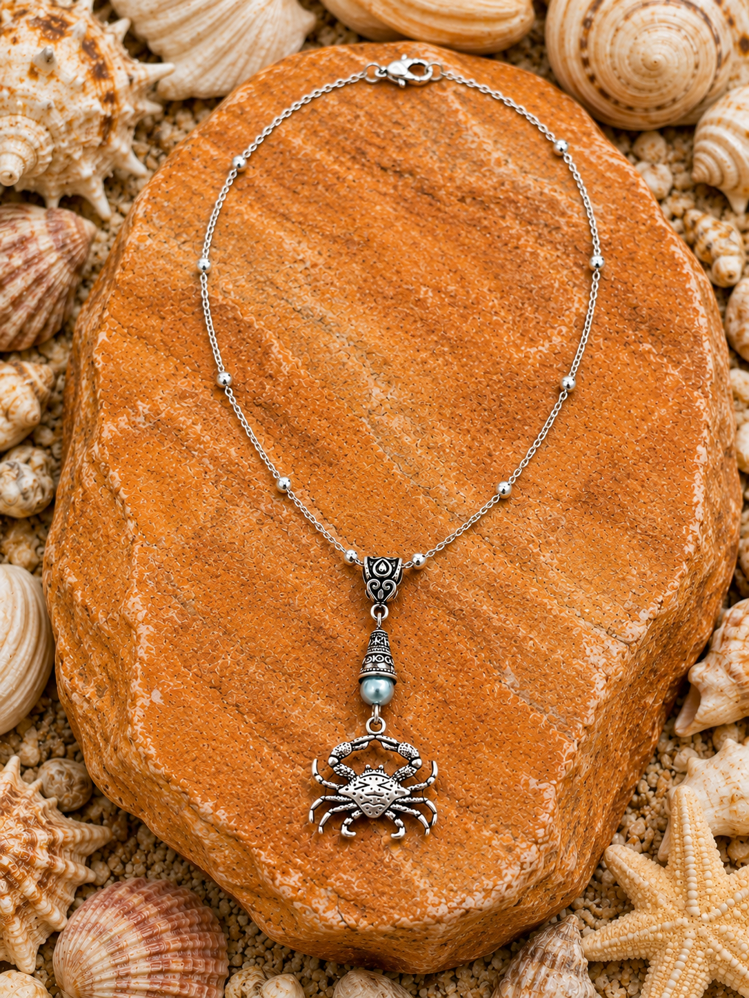 Crab Necklace Orange Stone ChatGPT.png