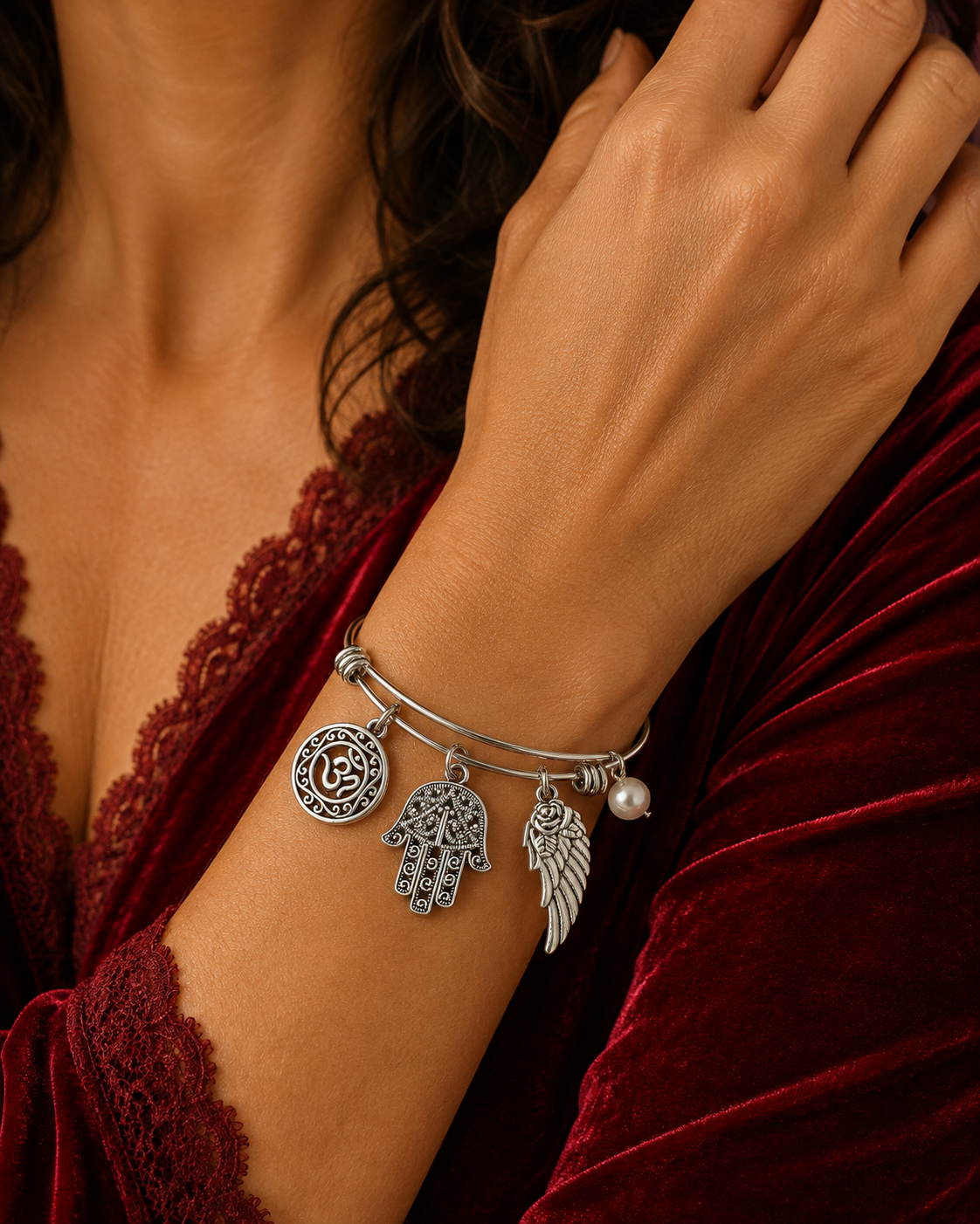 Om Hamsa Wing Pearl Bracelet Model Velvet ChatGPT.png