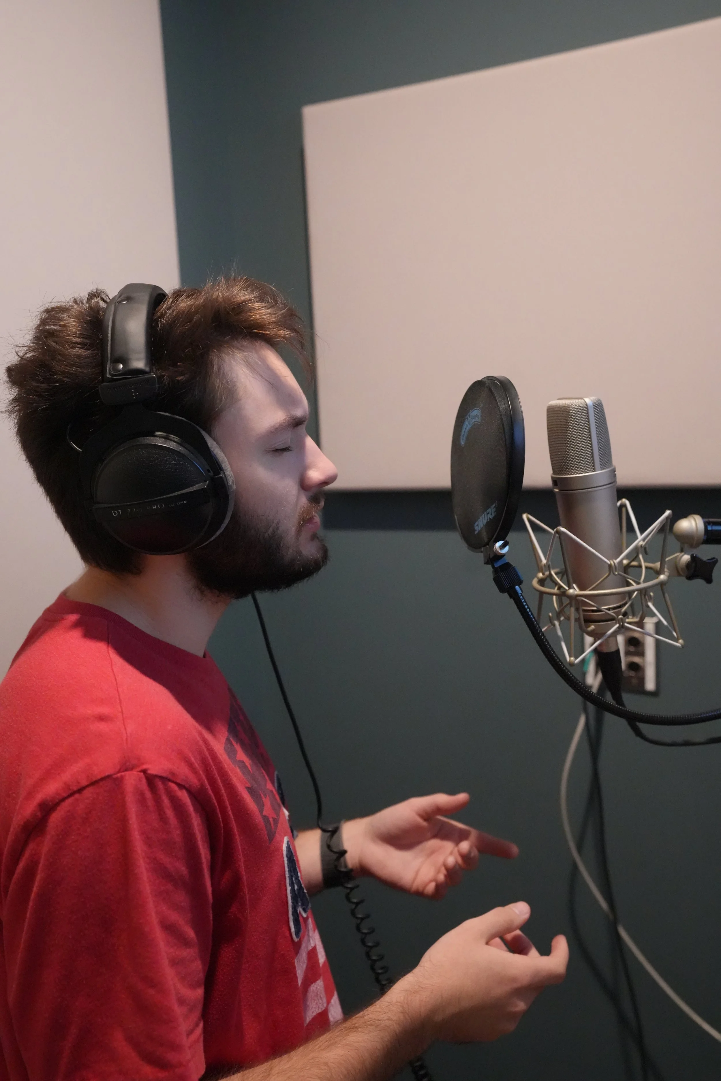 Patrick in Vocal booth 3.JPG