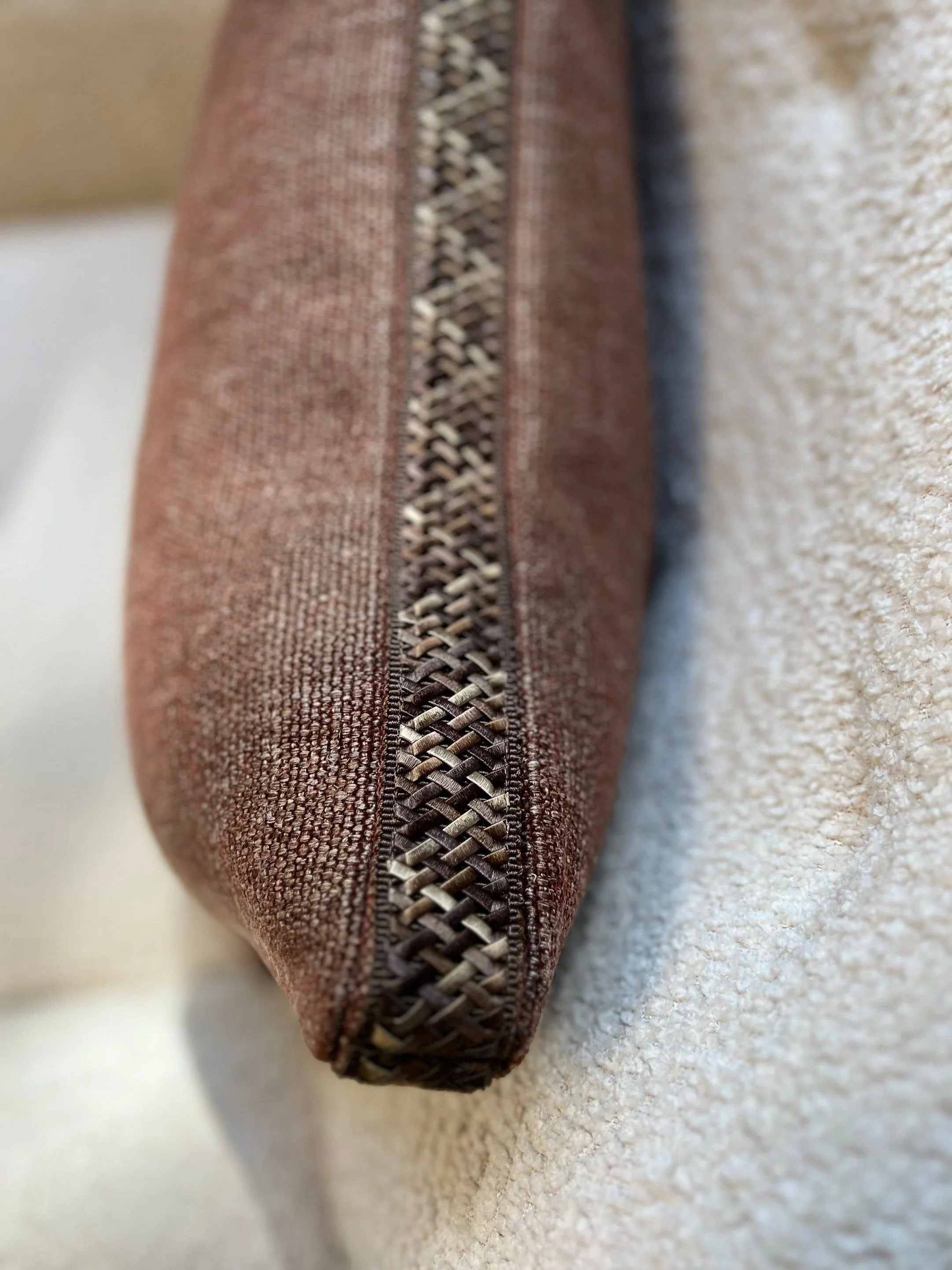 Box pillow with tape trim