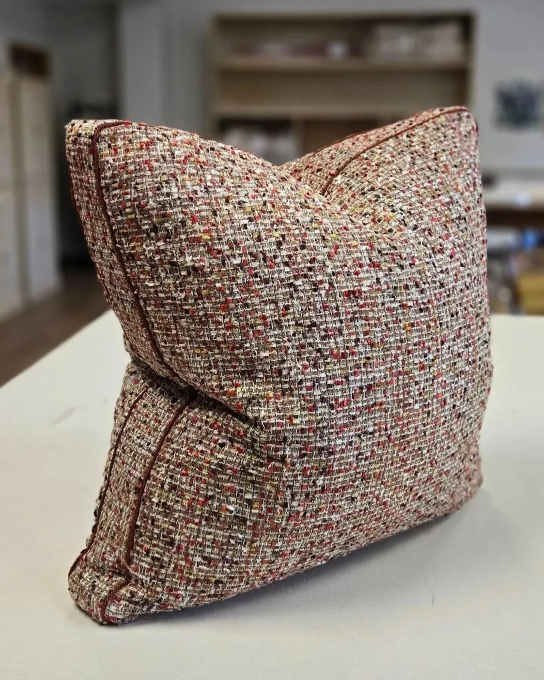 Pillow with box edge and contrast micro welt from LP Studio workroom in Woodinville, WA