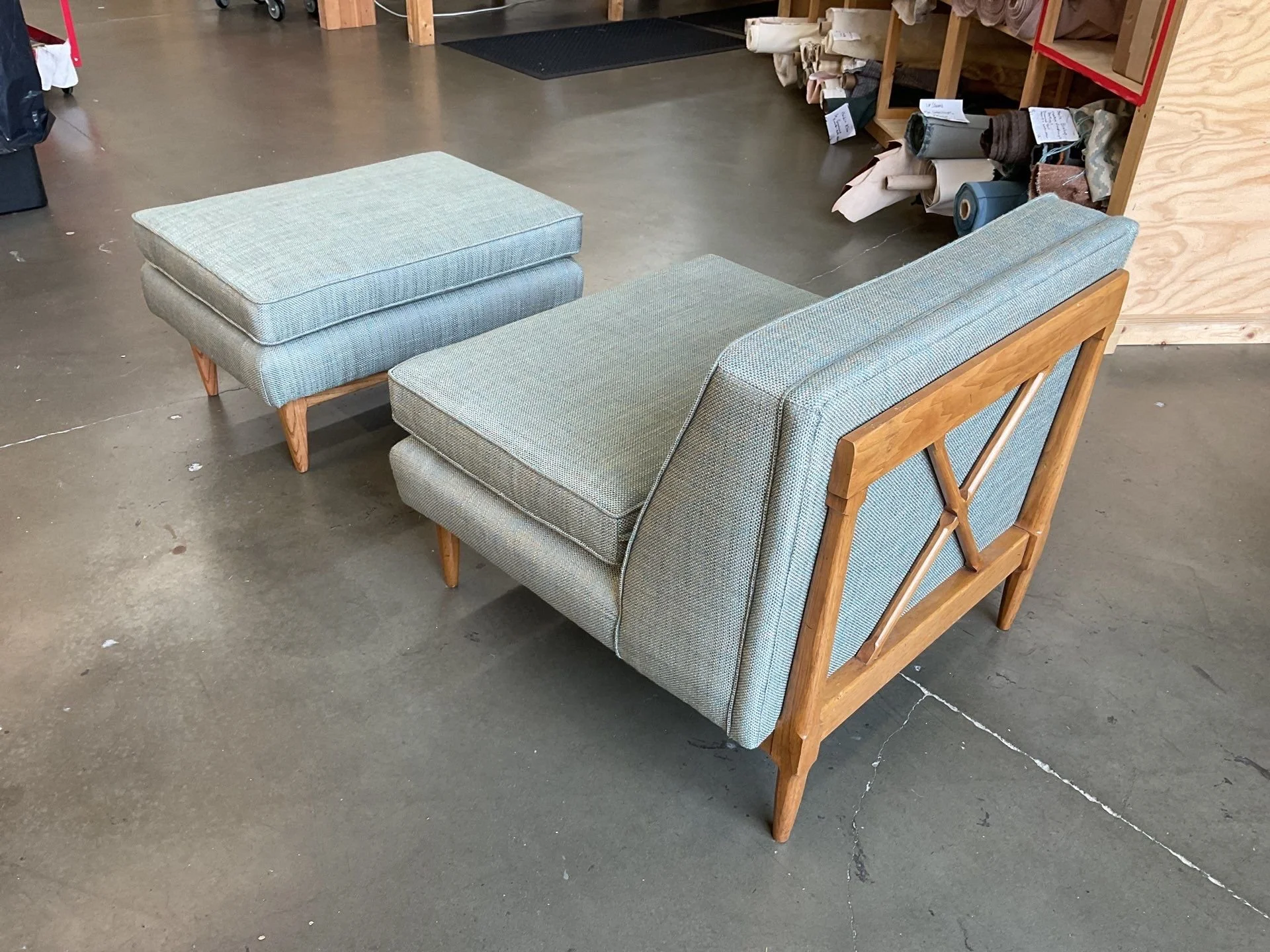 A wooden-framed Midcentury style modular sofa with light blue patterned upholstery Created by LP Studio in Woodinville, WA.