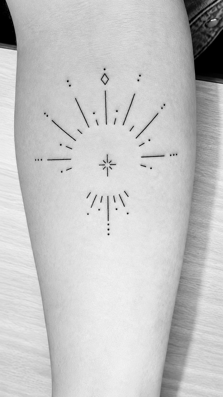 Custom ceremonial Handpoke tattoo inspired by sacred geometry