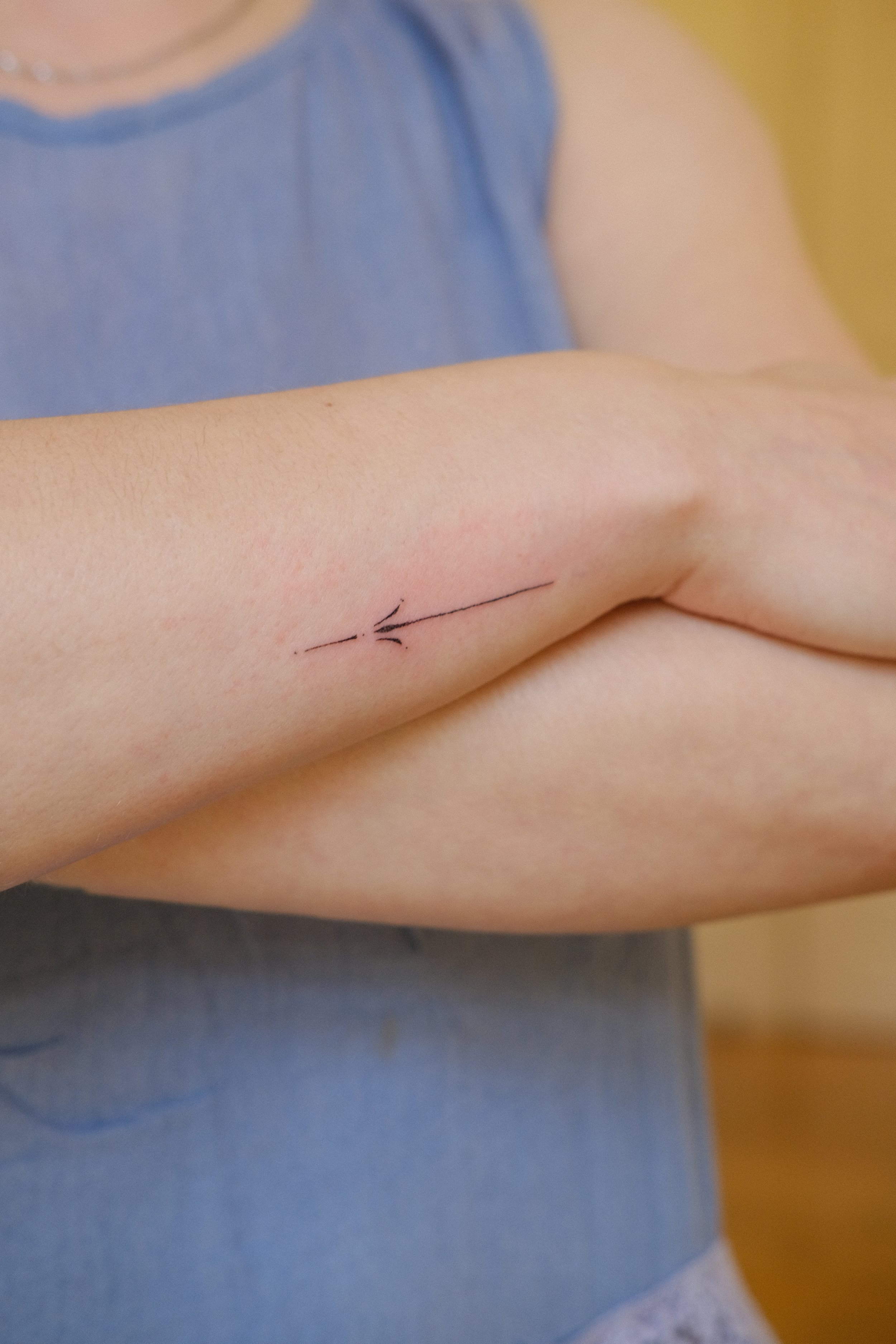 Minimalist Handpoke tattoo with intentional design