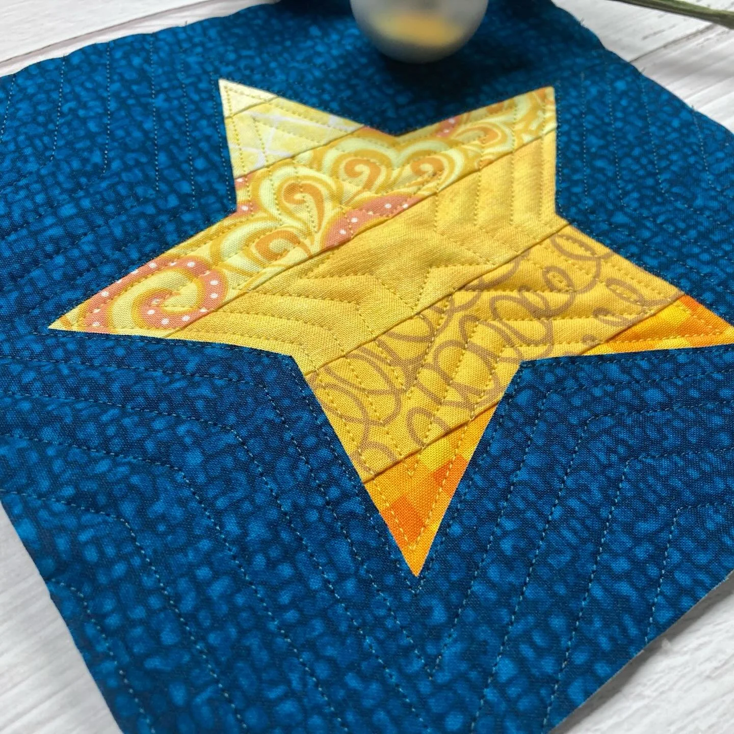 Strippy Improv Holiday Day 11: Machine quilting! 
Custom is always fun - you can highlight the shapes in the blocks and do fun designs in the frames and borders (all the custom examples you see in this post are from machine quilter extraordinaire @qu