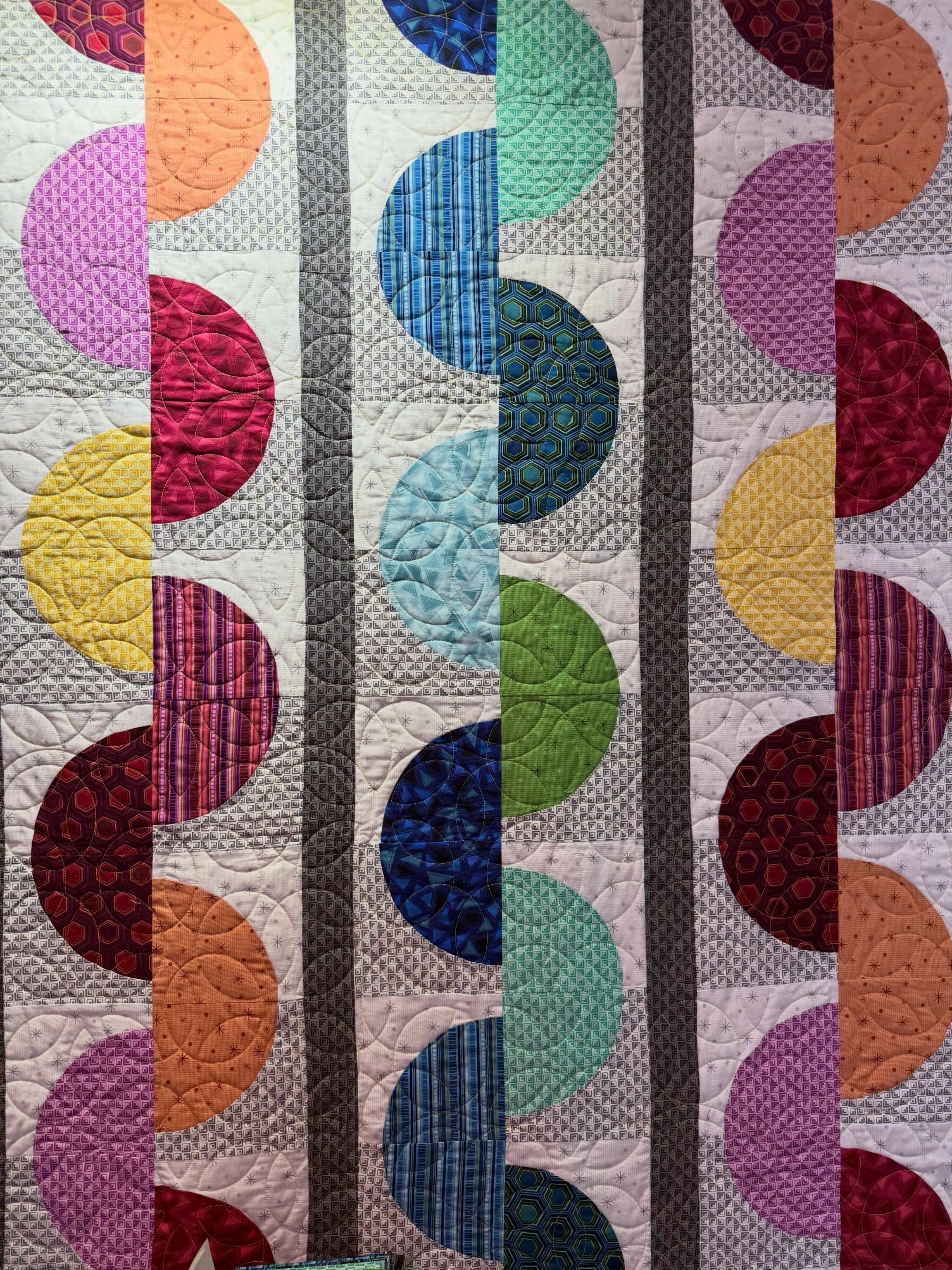 Today&rsquo;s textured close-ups of Curlicues and Pixel Pop are brought to you from the @benartex_fabrics booth at H+H. These quilts were both quilted by @quiltingandcats last week - she pieced Pixel Pop too! I wouldn&rsquo;t have these quilts to sho