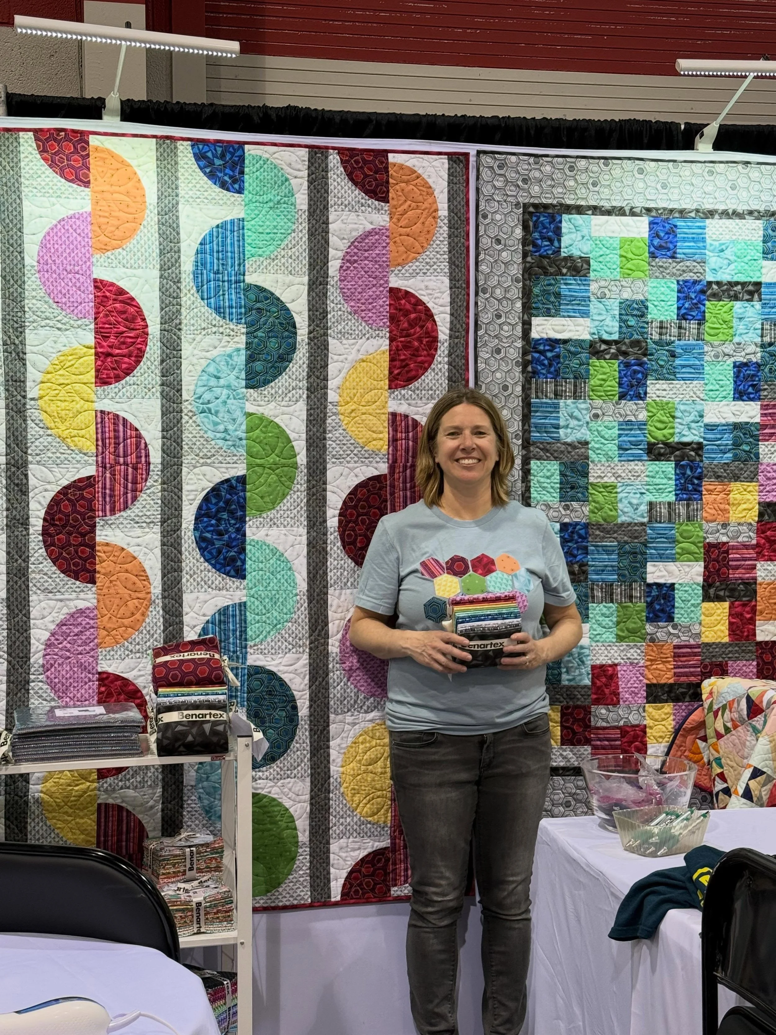 I came home from H+H and got the ground running Friday with a soccer game, track meet and parents visiting from out of town! Here are a couple more booth pics of quilts made from my new Refresh collection(plus a bonus pic of my Echo quilt which wasn&