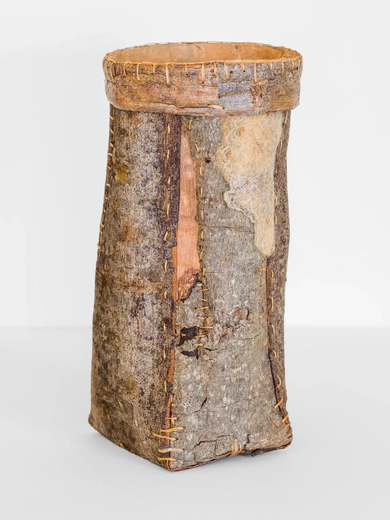 Visible Mending 2024 | Poplar bark, handmade wool felt with flax, waxed linen. 10 x 5 x 5 inches