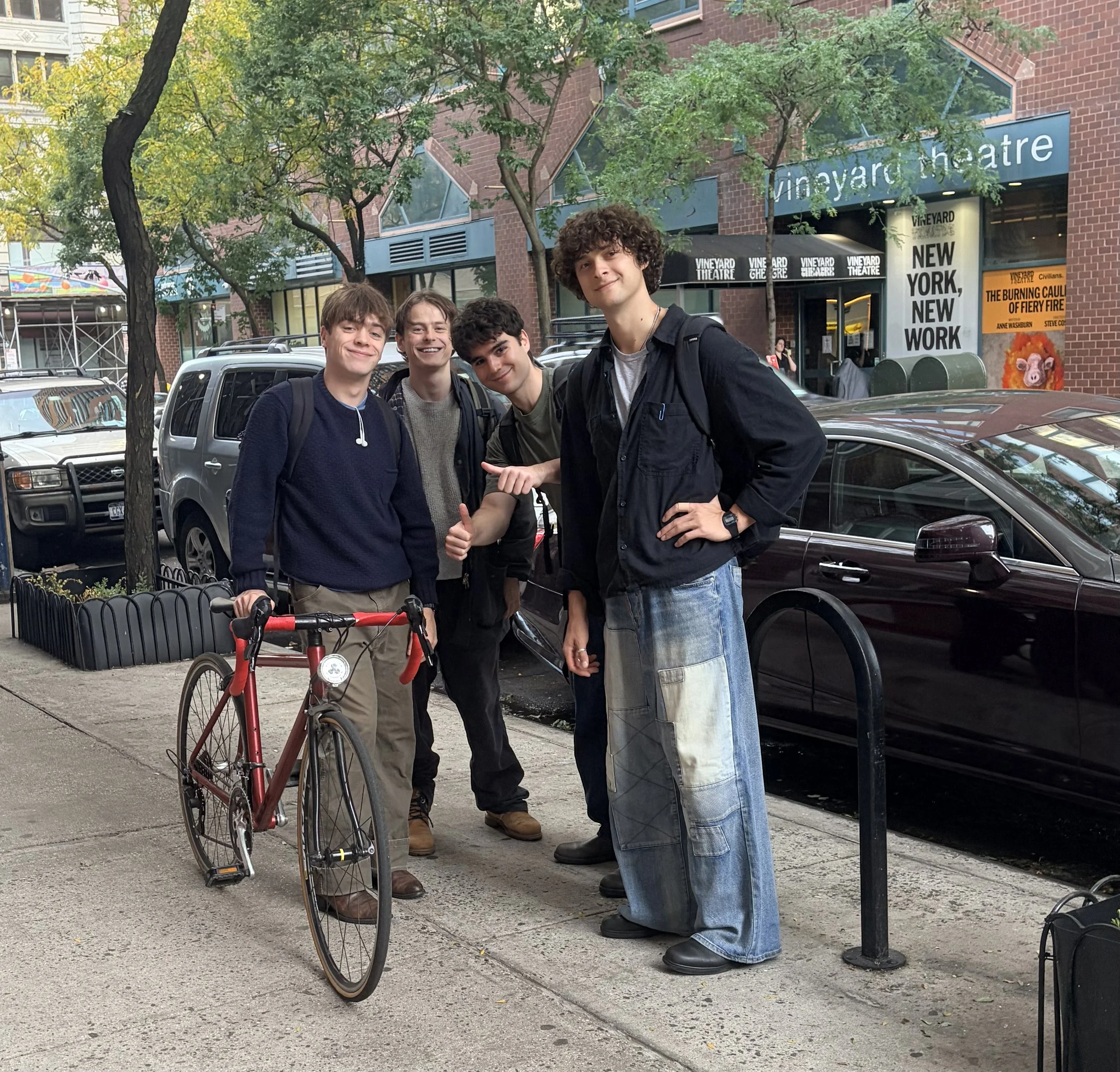 Cormac, Rory, Leo, and Petro outside the Vineyard after a reading of "We Can't Be That Special" by YPU 