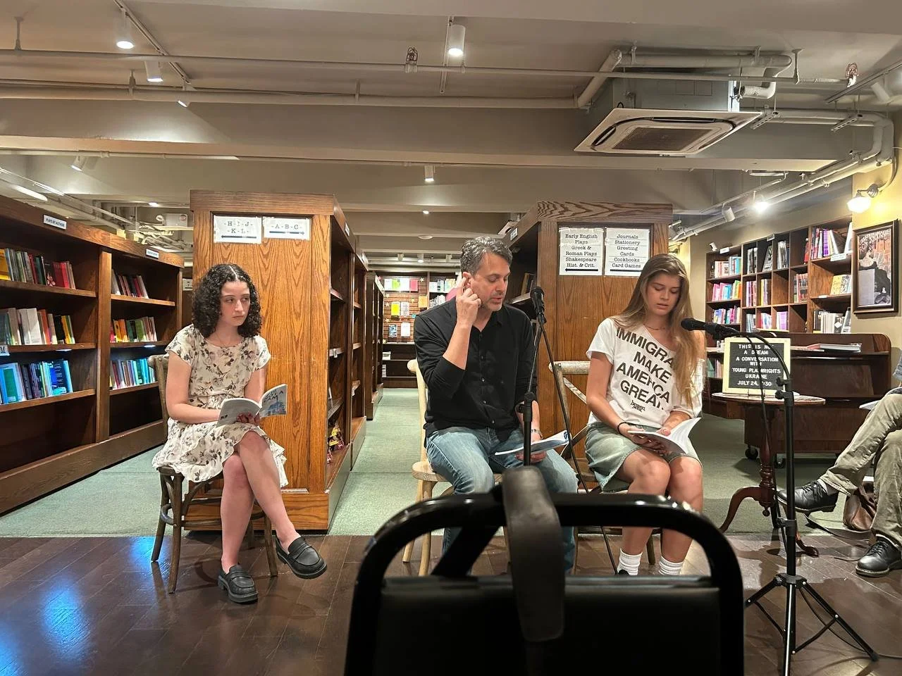 Reading stage directions at the Drama Book shop (actors Tommy Sadoski and Taya Fedorenko)